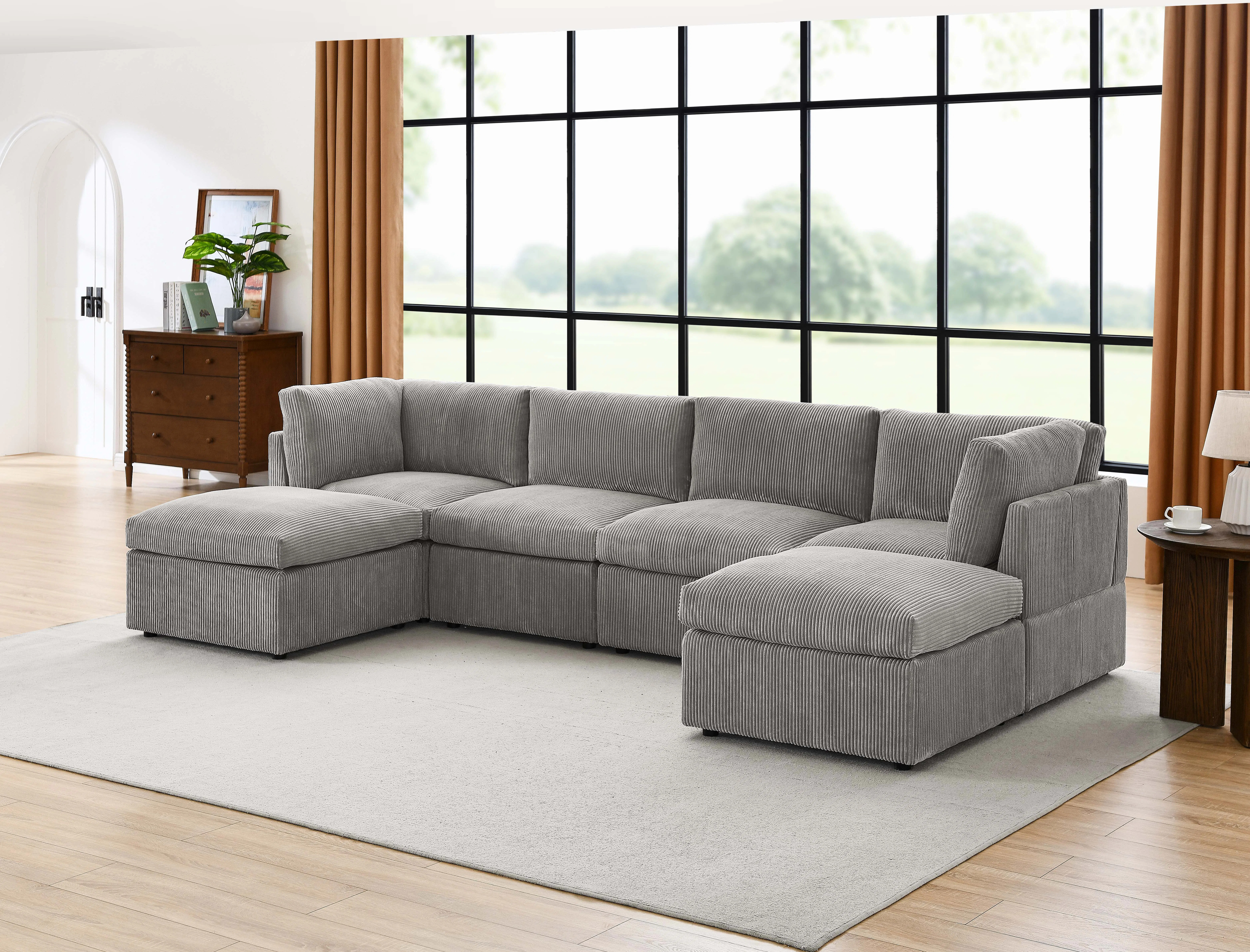 Annai 129" Wide Reversible Modular Corner Sectional with Ottoman | Wayfair North America