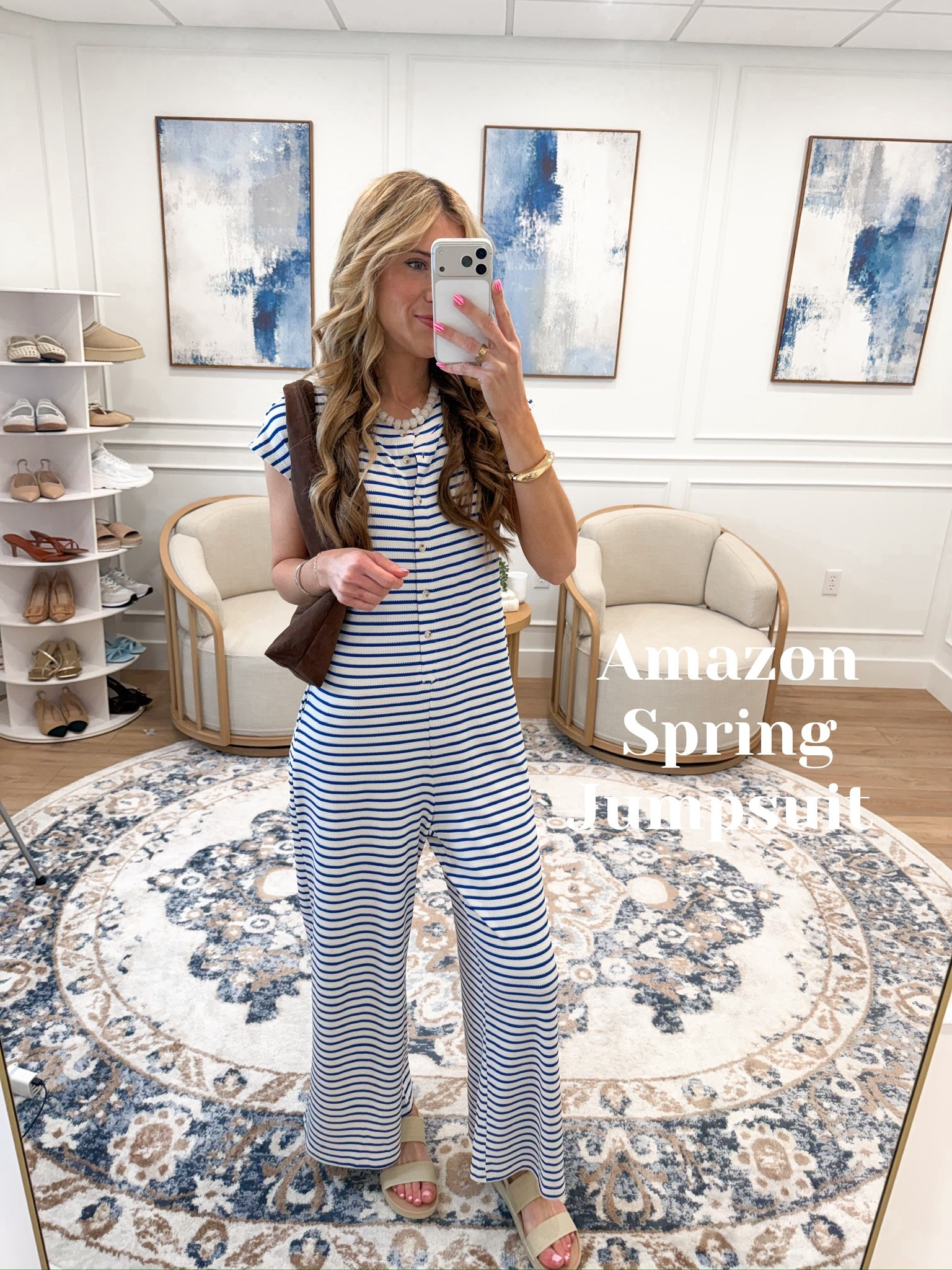 Amazon finds that are so good right now and this blue and white striped wide leg jumpsuit is everything summer needed 🤍✨ Horizontal stripes, short sleeves, a button front placket, wide leg silhouette that falls so perfectly — it is one piece and the entire outfit is completely done. Paired with nude sandals, a brown shoulder bag, and a pearl necklace and this whole look feels so polished and so effortless.

#LTKootd #LTKSeasonal #LTKmomlife