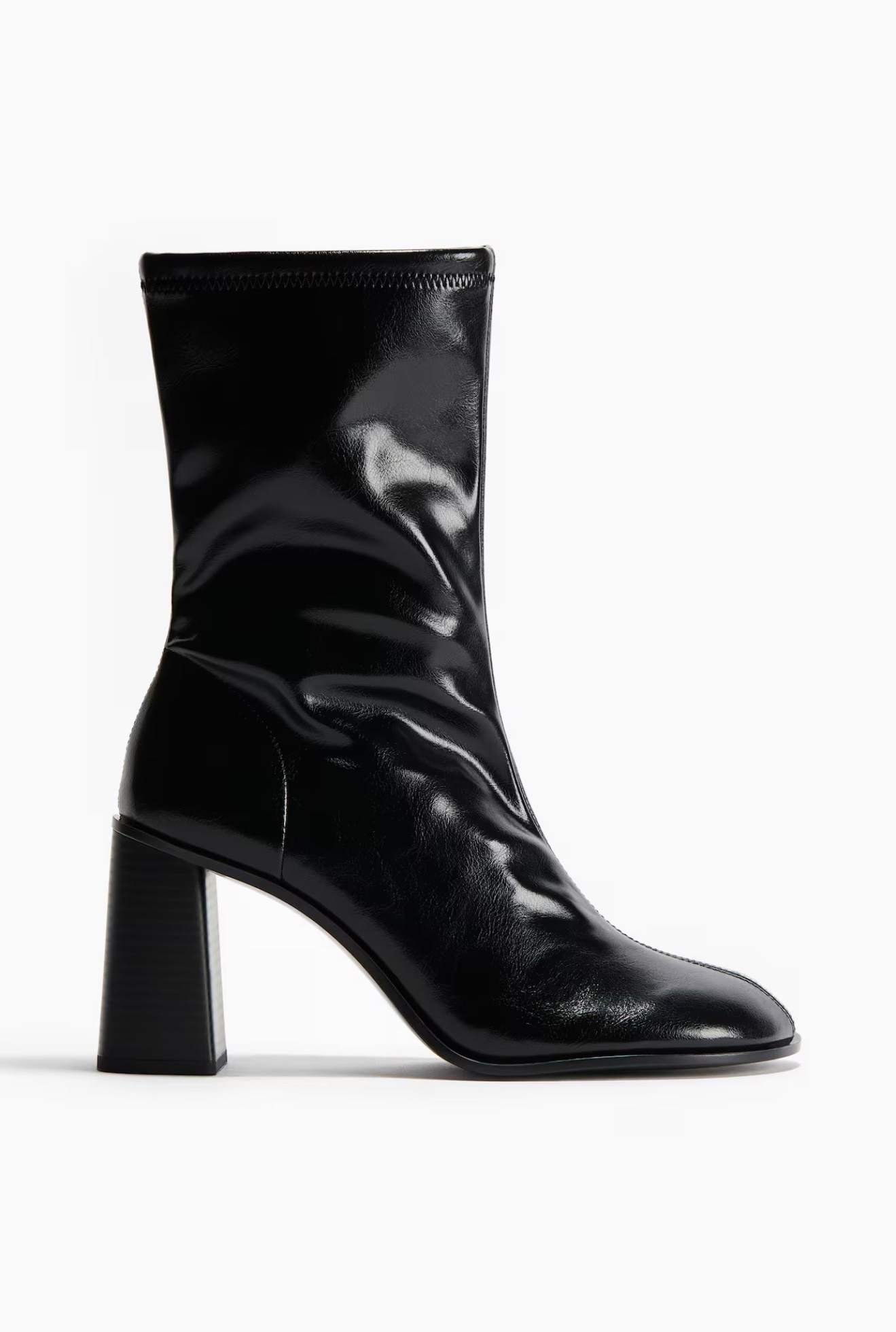 Block-heeled ankle boots. Angular toes, a seam at front, and close-fitting legs with a zipper at one side.

#LTKpartywear #LTKcanada #LTKshoes