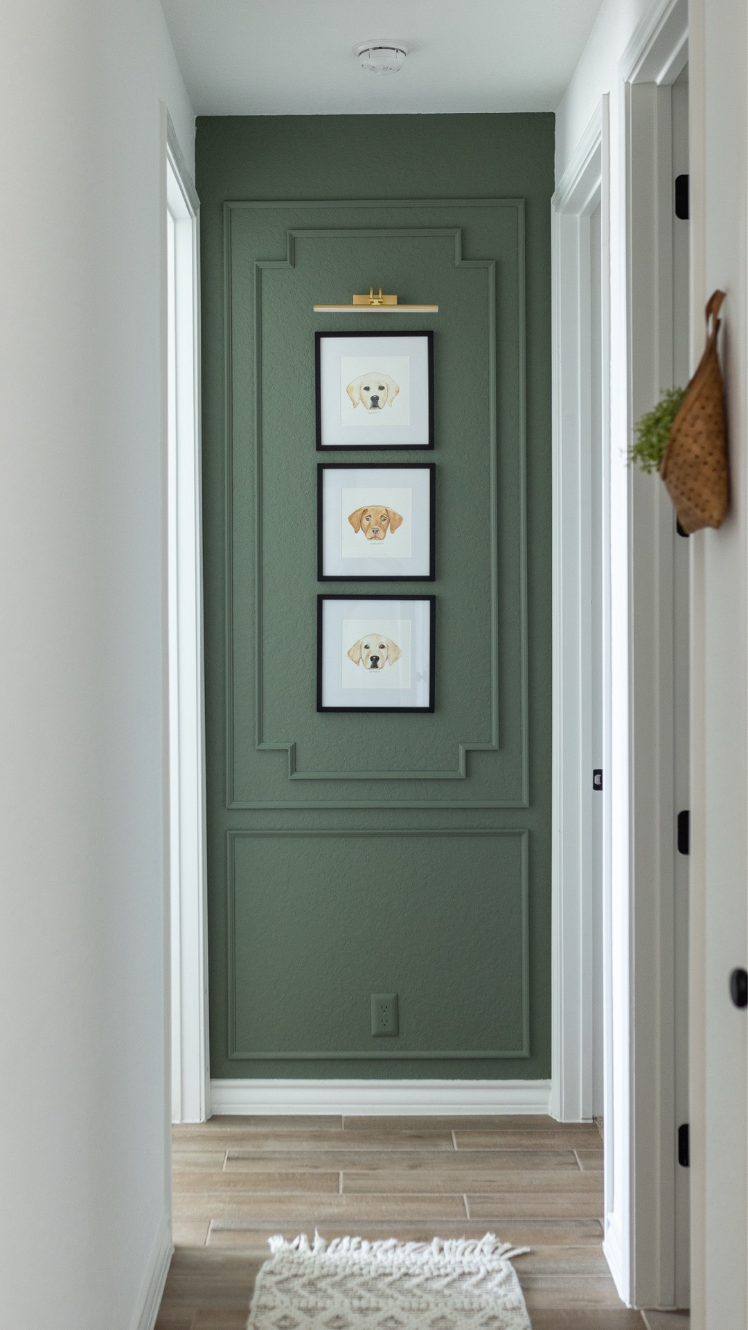 One of my favorite DIY transformations is this little end-of-hallway nook. 🤍

It used to be one of those spaces that you walk past every day without giving it a second thought. A little decorative picture frame moulding, a coat of SW Dried Thyme, and three watercolor portraits of the dogs as puppies by a talented artist completely changed it.

Now it feels intentional and makes me smile every time I walk by.

Sometimes the smallest corners end up adding the most personality to a home.

#LTKHome #LTKstorytime