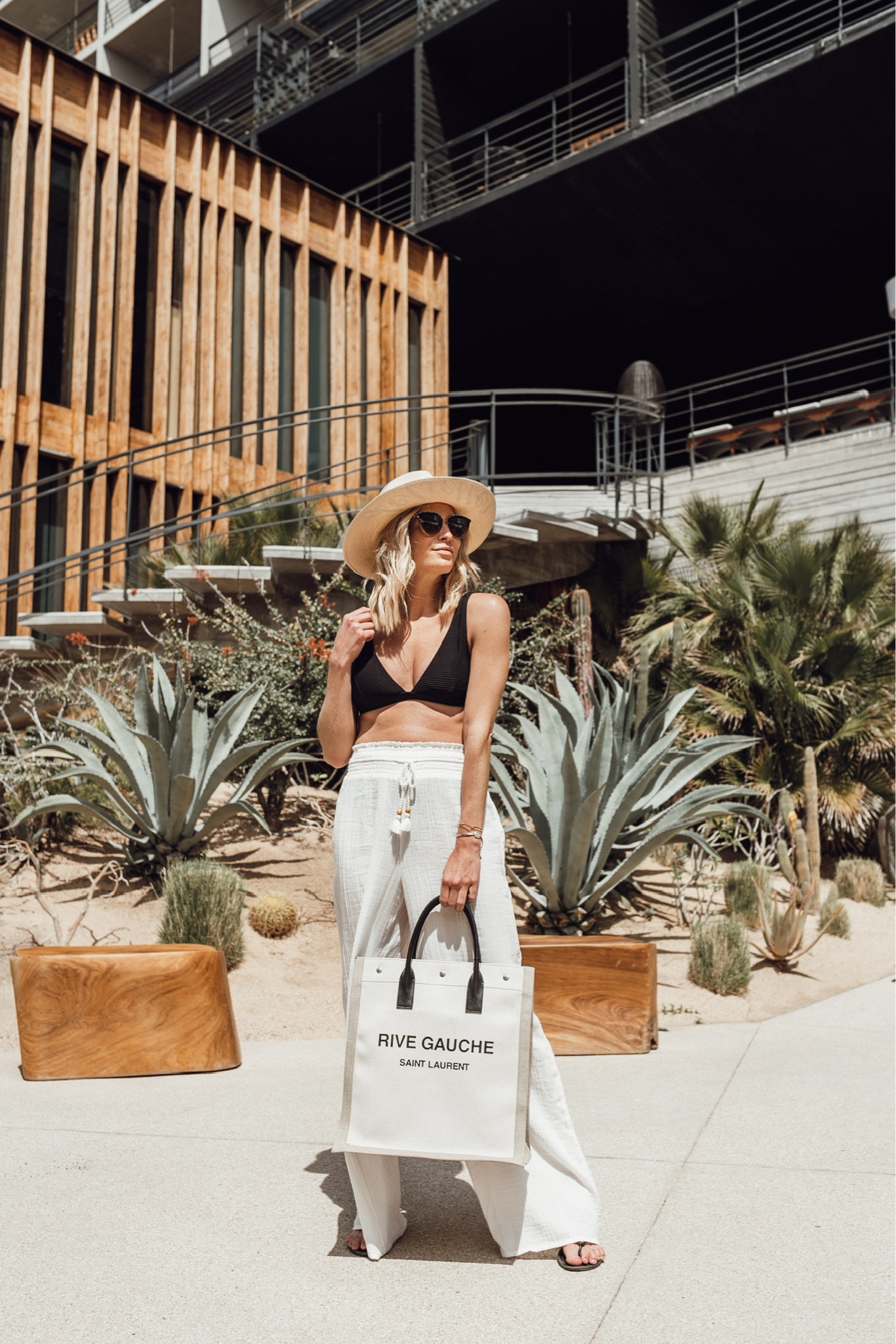 Black swimsuit, white gauze pants, beaxh tote, hat, sunglasses and Tory Burch Miller sandals. 

#LTKFind #LTKswim #LTKtravel
