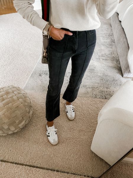 Kick crop jeans are really cute. Center seam and nice washed black color. Raw hem. Size down. 
Samba sneakers. 
Henley sweatshirt in terry material  

#LTKfindsunder50 #LTKsalealert #LTKover40