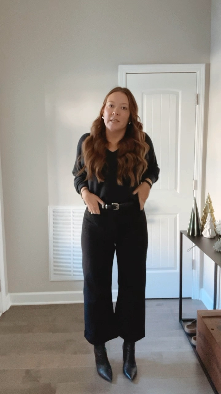 Black sweater - super soft! / tts wearing a medium 
Black wide leg cropped jeans - tts wearing a 28 (if in between, side down) 
Black and silver belt - wearing a medium 
Black booties - tts wearing a 7.5
Silver teardrop earrings from Amazon 
Evil eye necklace 
Gold watch 
Silver ring 

#LTKWatchNow #LTKWorkwear #LTKShoeCrush