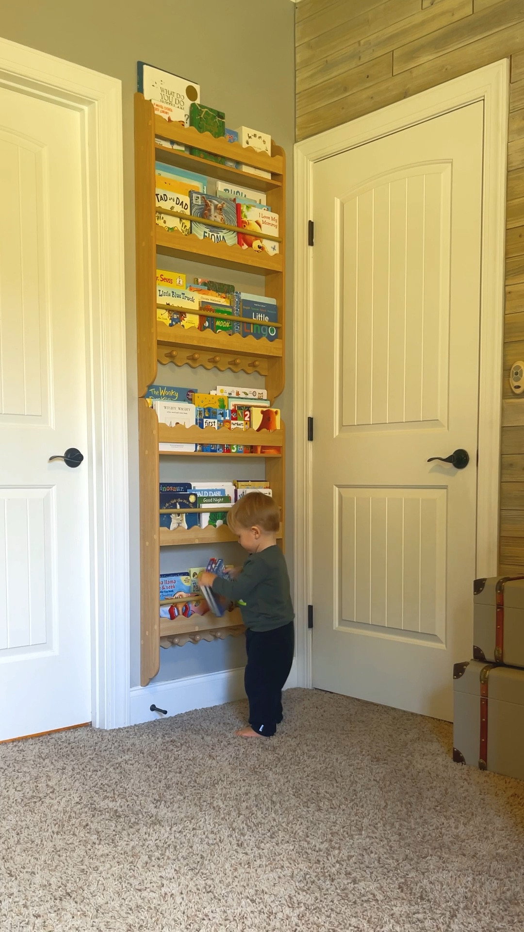 After searching for *months* for a bookshelf that was both functional for our space (could fit behind A’s bedroom door) and aesthetic, I think I finally found it! I ordered two of these wall-mounted bookshelves and installed them one on top of the other to fit our mountain of books, and I love how it turned out! Between the two bookshelves, I think they’re holding about 100 books! 📚 

#LTKFamily #LTKBaby #LTKBump
