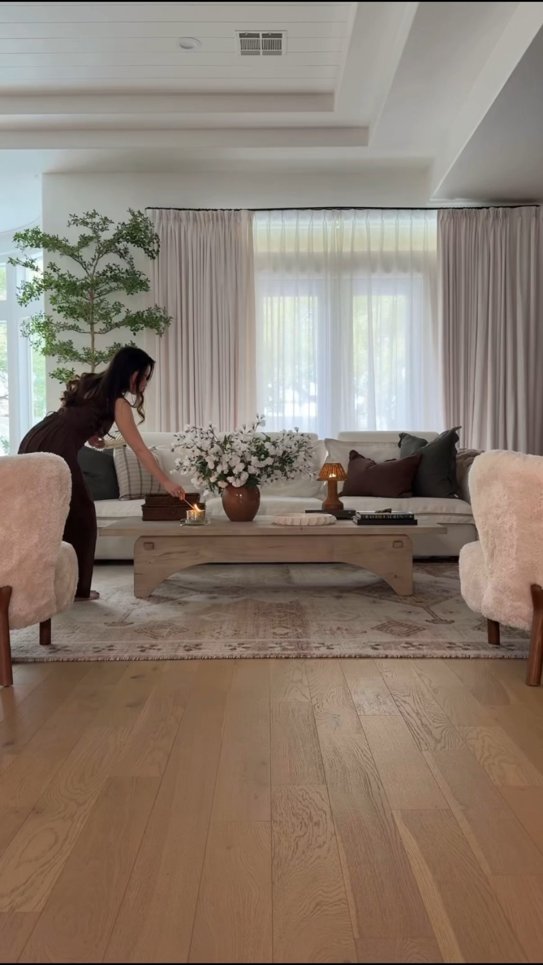 Living room 

Brown rug, green pillows, mini lamp, tree, brown dress, coffee table 

#LTKSaleAlert #LTKHome #LTKmomlife