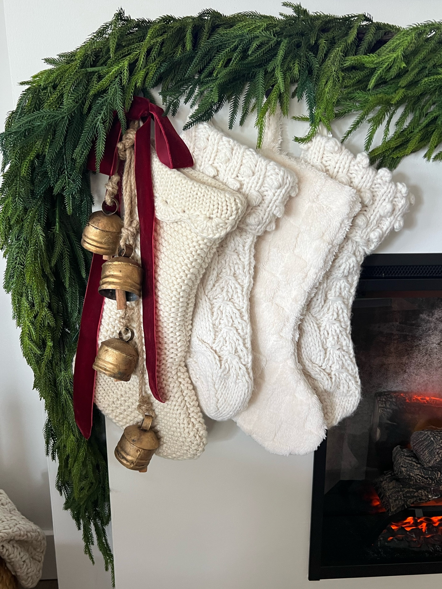 Added a couple more knit stocking to my Christmas mantle, holiday mantel, Christmas fireplace mantel, stockings, hanging bells, Norfolk garlandds

#LTKFindsUnder50 #LTKHoliday #LTKHome