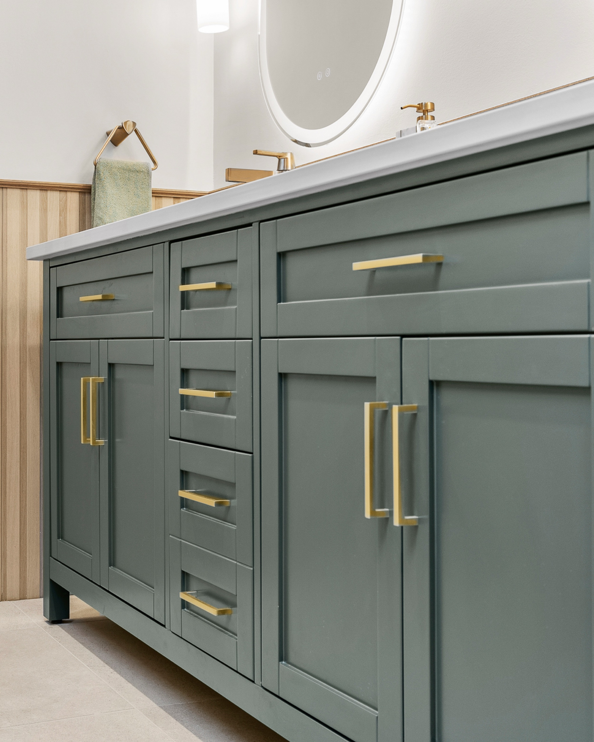 A budget friendly pre-fab vanity! Double sinks, beautiful green finish, brass hardware and fun features inside.👀

#LTKStyleTip #LTKHome #LTKU