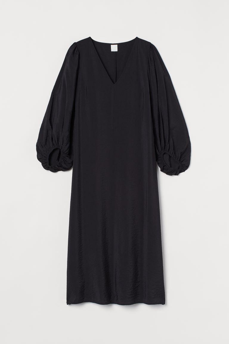 Calf-length dress in woven fabric made from a viscose blend with a V-neck and long balloon sleeve... | H&M (US + CA)