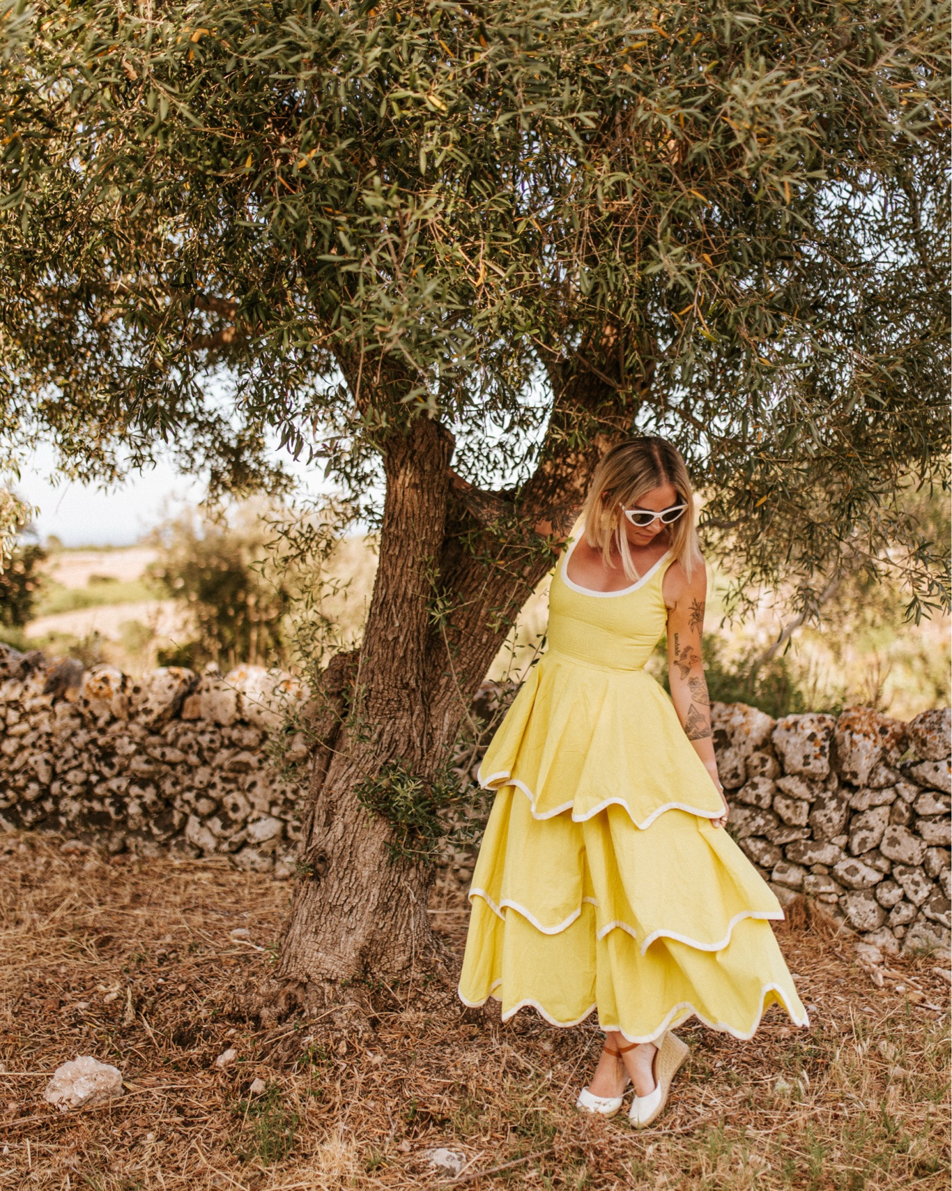 The spectacular lemon-yellow Alli Marye dress 🍋 The cascading ruffles and fitted bodice are pure European-summer magic. The dress can’t be tagged, but I linked the sunglasses, shoes, and similar styles! 💛🇮🇹

#LTKootd #LTKPetite #LTKTravel