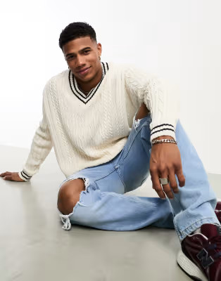 ASOS DESIGN oversized cable knit cricket sweater in cream & navy tipping | ASOS (Global)