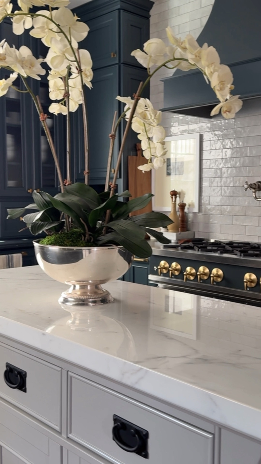 The insanely realistic (and real touch) faux orchids I swear by… I love these and use them year-after-year! 

#LTKHome #LTKSeasonal #LTKSaleAlert