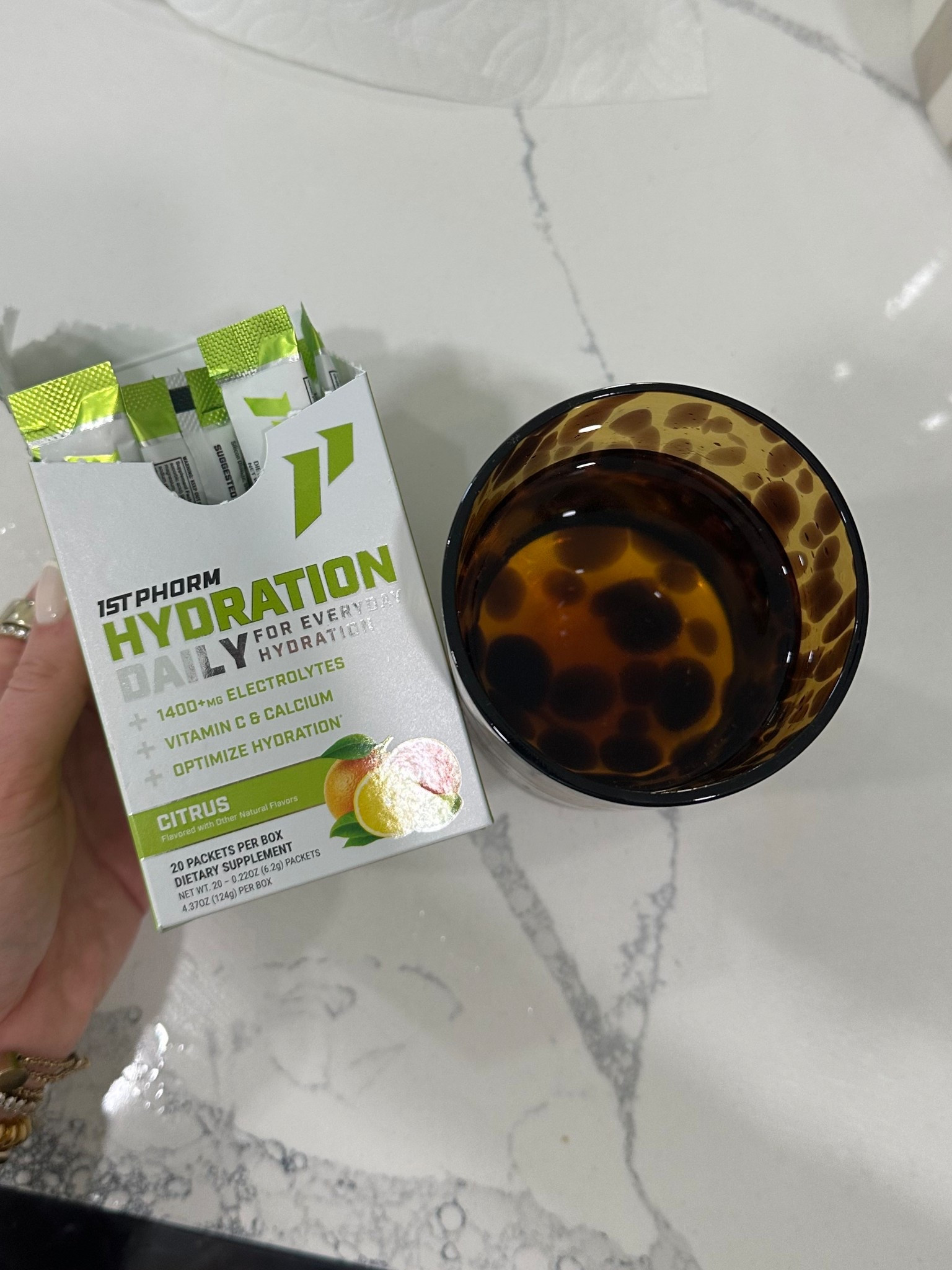 @1st Phorm Too many people only drink water for hydration and completely forget about the other aspect of hydration: maintaining the proper balance of essential vitamins, minerals, and electrolytes. This can leave them feeling depleted and unable to perform their best.

If hydration gets in the way of your overall health and fitness, Hydration Daily can help! Available in a variety of refreshing flavors, Hydration Daily comes in a box of 20 single-serve packets. As a dietary supplement, they're designed to help support everyday hydration and keep your body functioning at its best.

Hydration Daily can help support:

• Proper Hydration Balance  
• Electrolyte Replenishment  
• Overall Health & Wellness

Each convenient, mixable hydration packet contains over 1,150mg of vitamins, minerals, and electrolytes to help provide your body with what it needs to stay properly hydrated.

When it comes to hydration, electrolytes are essential. These minerals help regulate fluid balance, muscle function, and overall performance. Hydration Daily comes in convenient, on-the-go stick packs that deliver these key electrolytes in a zero-sugar, 5-calorie drink!

#LTKActive #LTKfitnessgoals #LTKfoodie