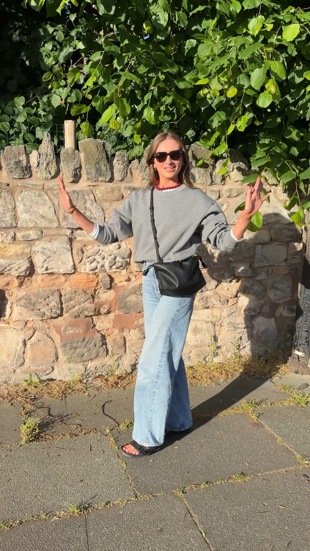 Small in the UNIQLO grey sweatshirt
Long sleeve Uniqlo white tshirt underneath
23 in the Ayla jeans
Matalan bag
Birkenstock sandals
Rayban sunglasses
& other stories red beaded necklace 
B