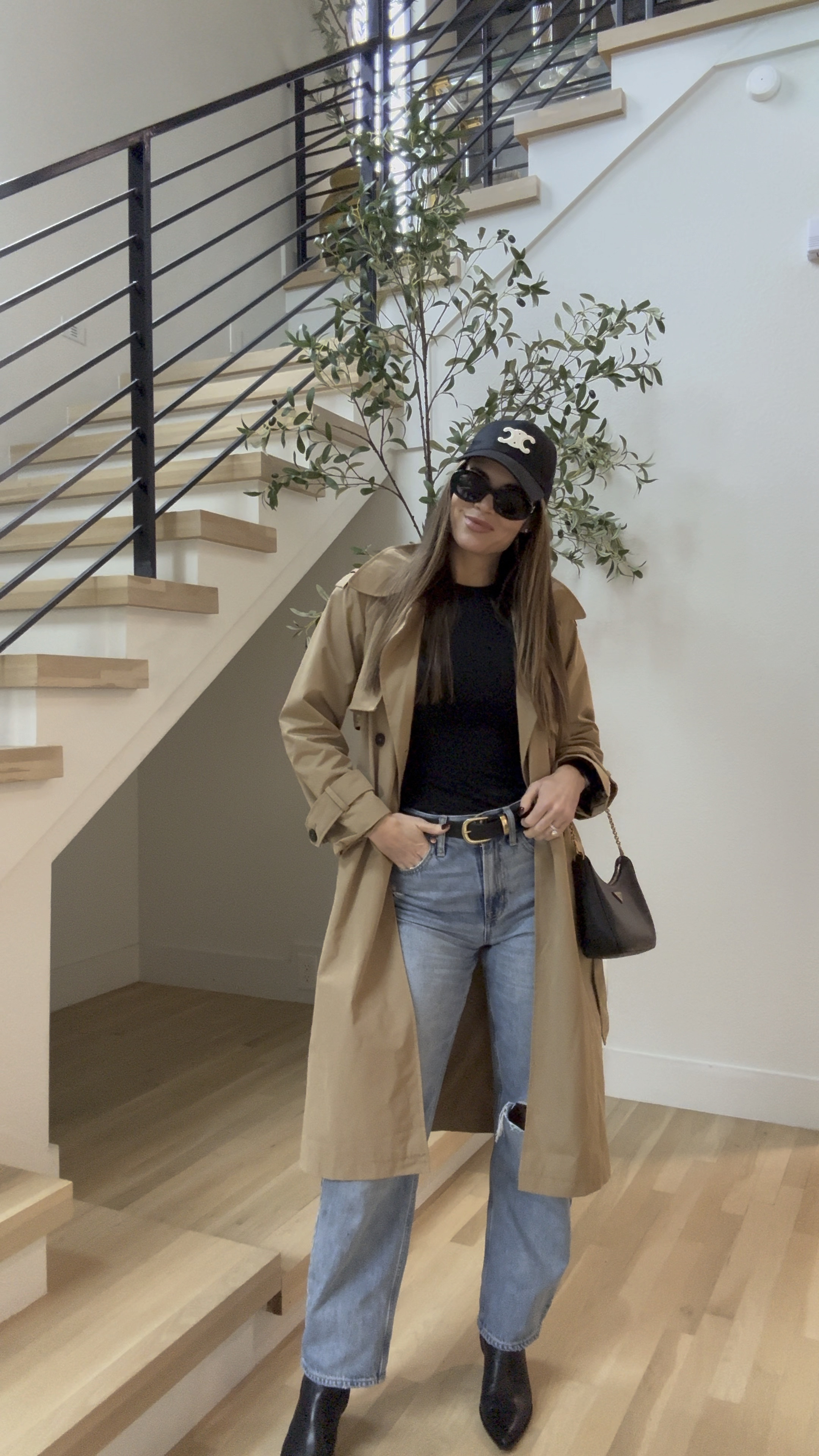 Rainy day outfit ! Barrel jeans from gap are my new go to ! Size 26 — classic trench coat is Abercrombie ! Basic black long sleeve top is Amazon and so is belt ! Booties are dolce vita and hat and sunglasses are Celine 

#LTKStyleTip #LTKHoliday #LTKGiftGuide