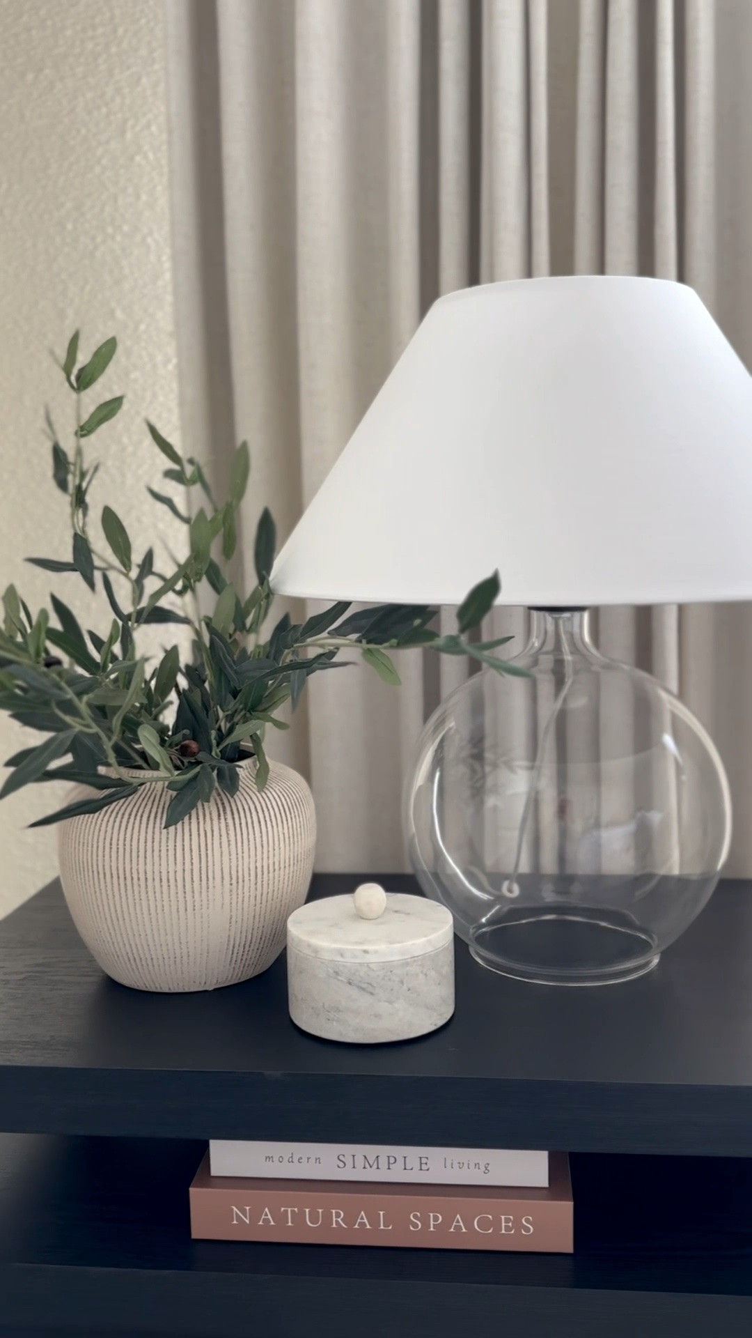 Pottery Barn look for less! $50 glass lamp base + empire lampshade! Change out any old lampshade to one you love using this lampshade adapter. It goes right onto the bulb!

Lamps, nightstand, nightstand decor, nightstand styling, bedroom decor, design inspiration, bedroom ideas, olive stems, home decor, designer look for less, design help

#LTKHome #LTKSaleAlert