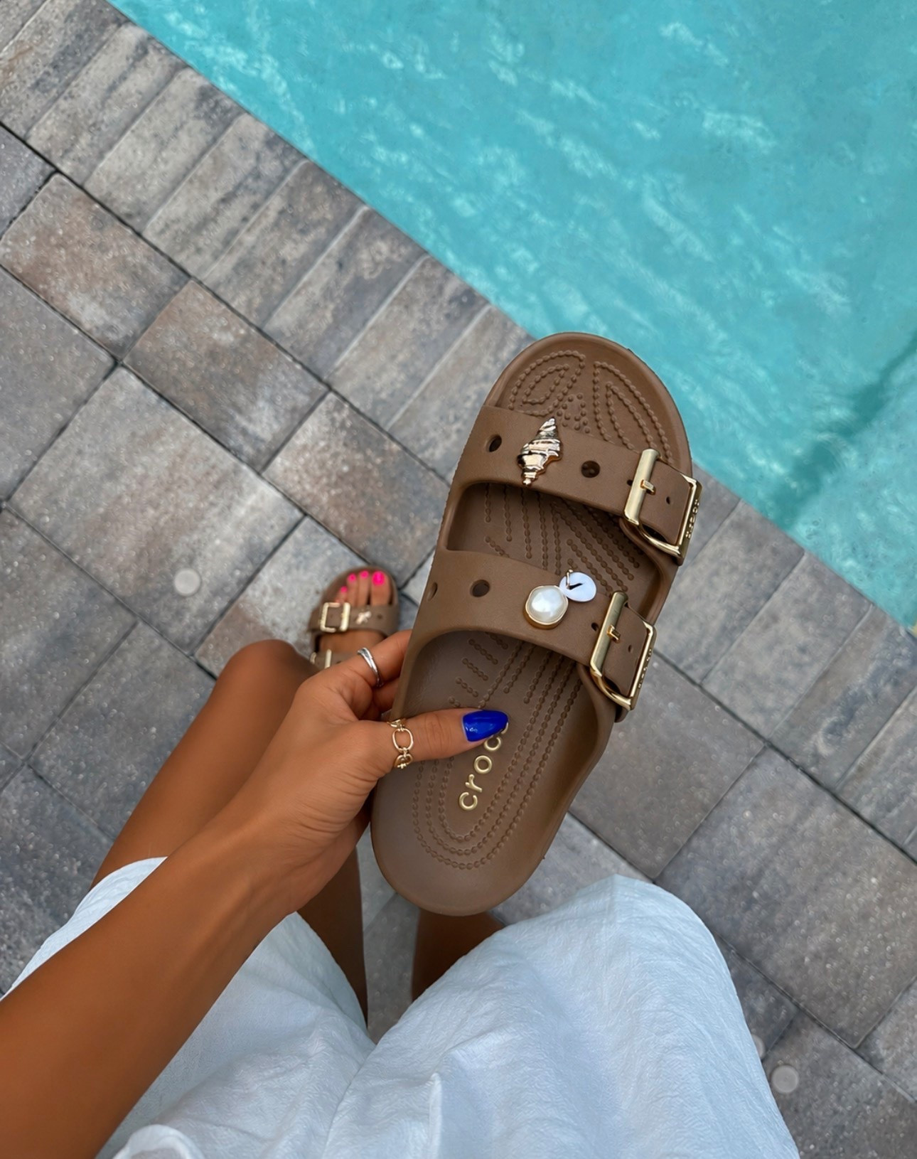 These crocs are so comfy and I’m loving the cute sandal charm trend! #summersandals