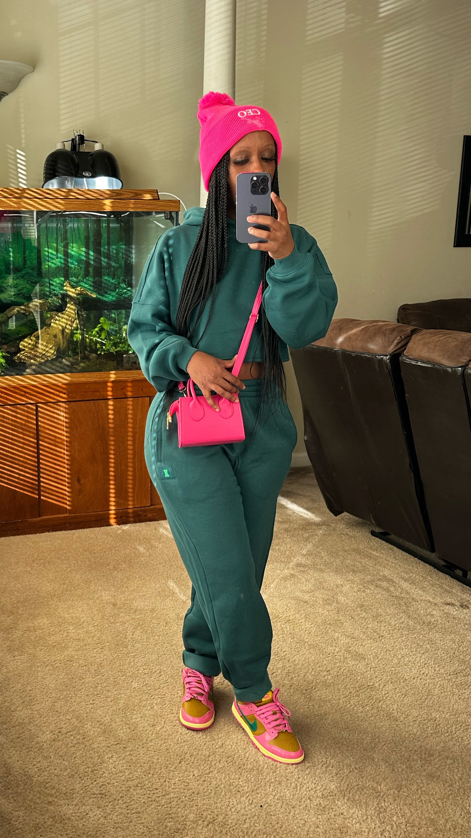 Green outfits. I’m wearing this Savage x Fenty cropped sweatshirt and joggers in a size Xsmall. I styled it with a pink pompom beanie and a pink crossbody bag for an added pop of color.

#LTKGiftGuide #LTKstyletip #LTKshoecrush