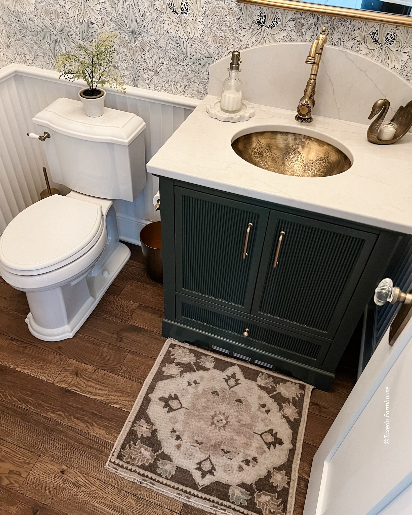 Sharing a few views of my guest bathroom. It’s small to harder to photo. This space was so fun to design. It’s a mix of elegance and whimsy. The sink is handmade and so cool. It has held up beautifully so don’t be afraid to purchase it. 

The rug is vintage. Door hardware is from Vandykes Restorers. Countertop is custom quartz  

#LTKStyleTip #LTKSeasonal #LTKHome