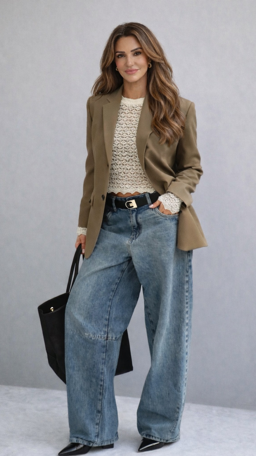 This look is giving modern power casual 🤎✨

You’ve balanced structure + ease perfectly:
	•	Double-breasted golden brown blazer → strong, tailored, polished
	•	Cream crochet sweater → softens it, adds texture
	•	Extra wide-leg denim → relaxed, current, very on-trend
	•	Black logo plaque belt → pulls everything together with contrast
	•	Black tote + pointed booties → sharp and elevated

It feels:
✔ Sophisticated but wearable
✔ Structured but not stiff
✔ Luxury-inspired without trying too hard

The brown + cream + denim + black combo is very editorial — especially with the wide-leg silhouette.

#LTKStyle
#LTKFinds
#LTKFall
#LTKSeasonal
#LTKUnder100

#LTKPlusSize #LTKdayinmylife