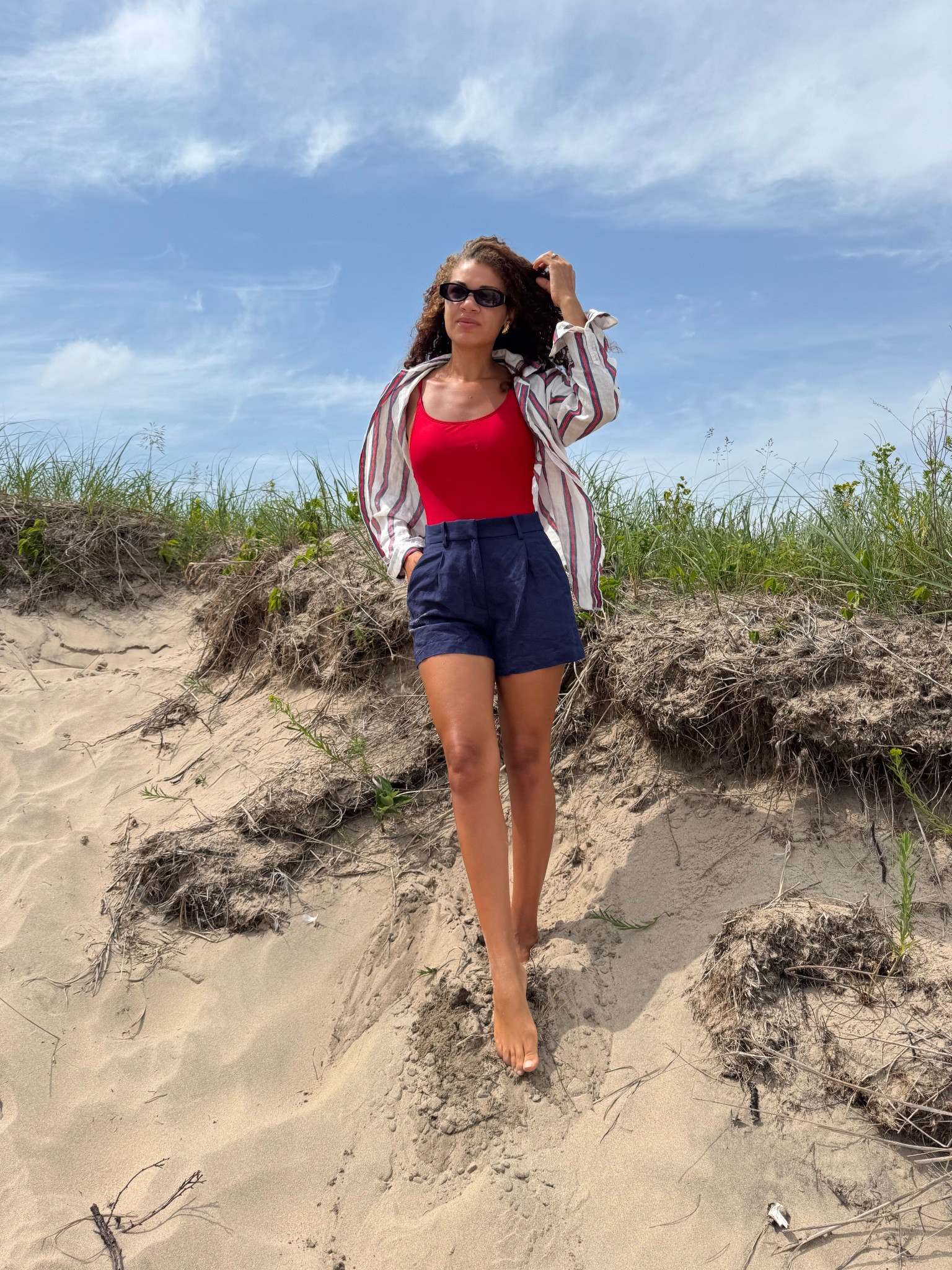 Beach to boardwalk outfit: red one piece swimsuit, navy blue shorts, striped linen button down 

#LTKSeasonal #LTKSwim