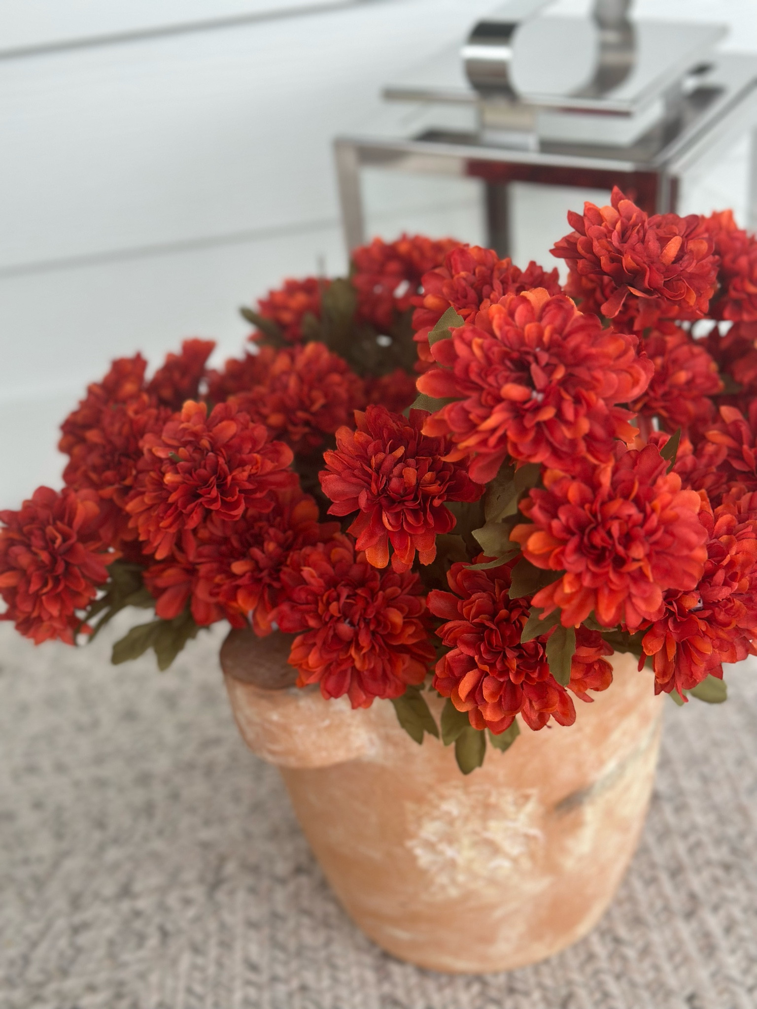 I found these beautiful dark orange marigold bush stems and could not pass them up! I used four in this small planter. These are so perfect for the porch for fall if you need something without any maintenance at an affordable price! 

Faux bush | dark orange marigold | fall florals | Michaels | fall faux florals | marigold | porch florals | fall floral inspo 

#LTKFind #LTKSeasonal #LTKunder50