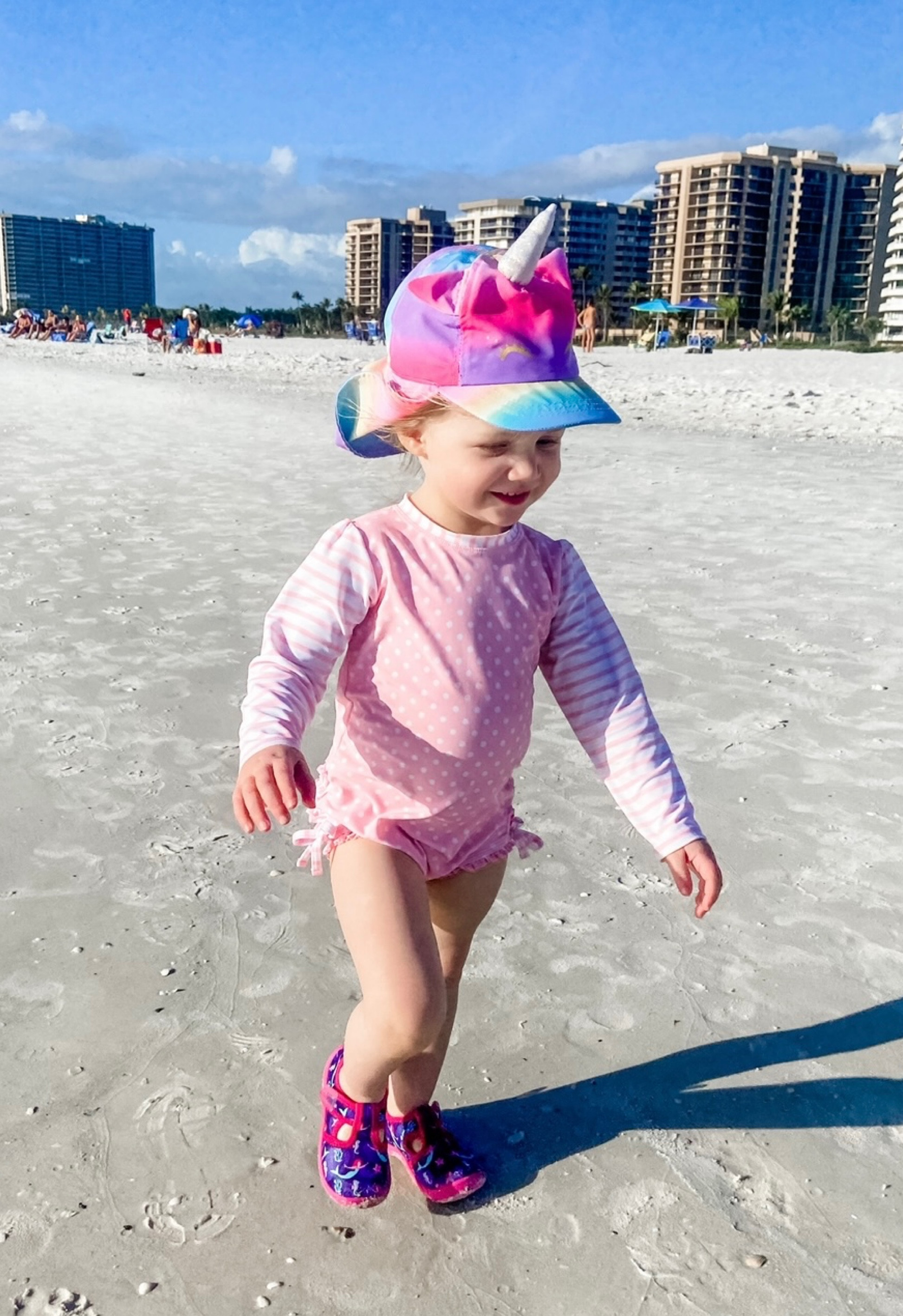 Toddler, little girl swimsuit, rash guard, ruffle butts, long sleeve, spf, sun hat, water shoes. Pink Polk a dot, beach, vacation , kids. Clothing. Swim cover up. 

#LTKkids #LTKbaby #LTKunder50