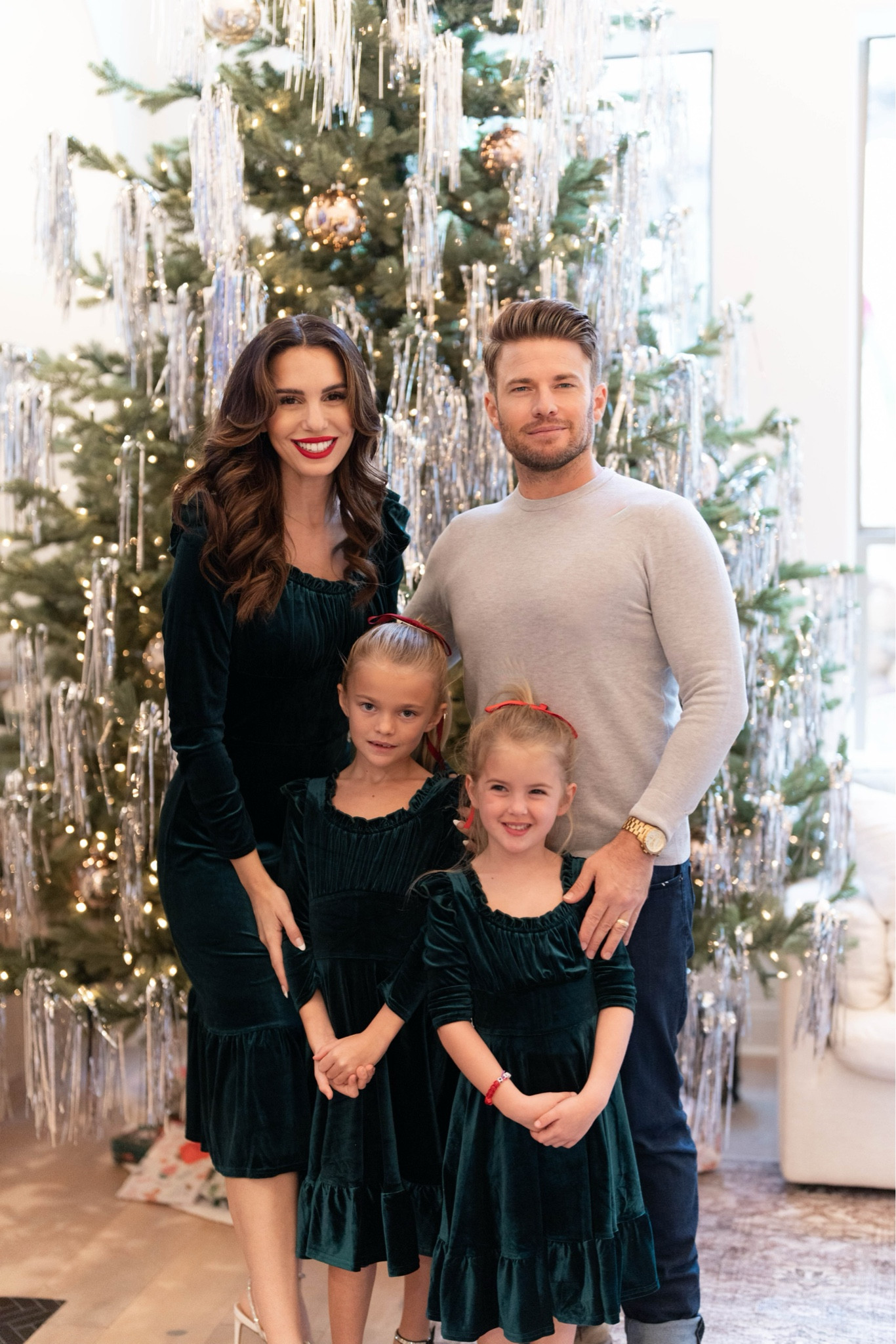 Our first family photo from our first holiday party! Recreate the festive vibe by trying out these matching long-sleeve green velvet dress from Ivy City for me and my girls and a gray sweater with denim pants for my hubby. Use code CHRISTY15 for 15% off your first Ivy City purchase! 
#holidaystyle #mensfashion #kidsclothes #winterwardrobe #mommyandme

#LTKSaleAlert #LTKStyleTip #LTKKids