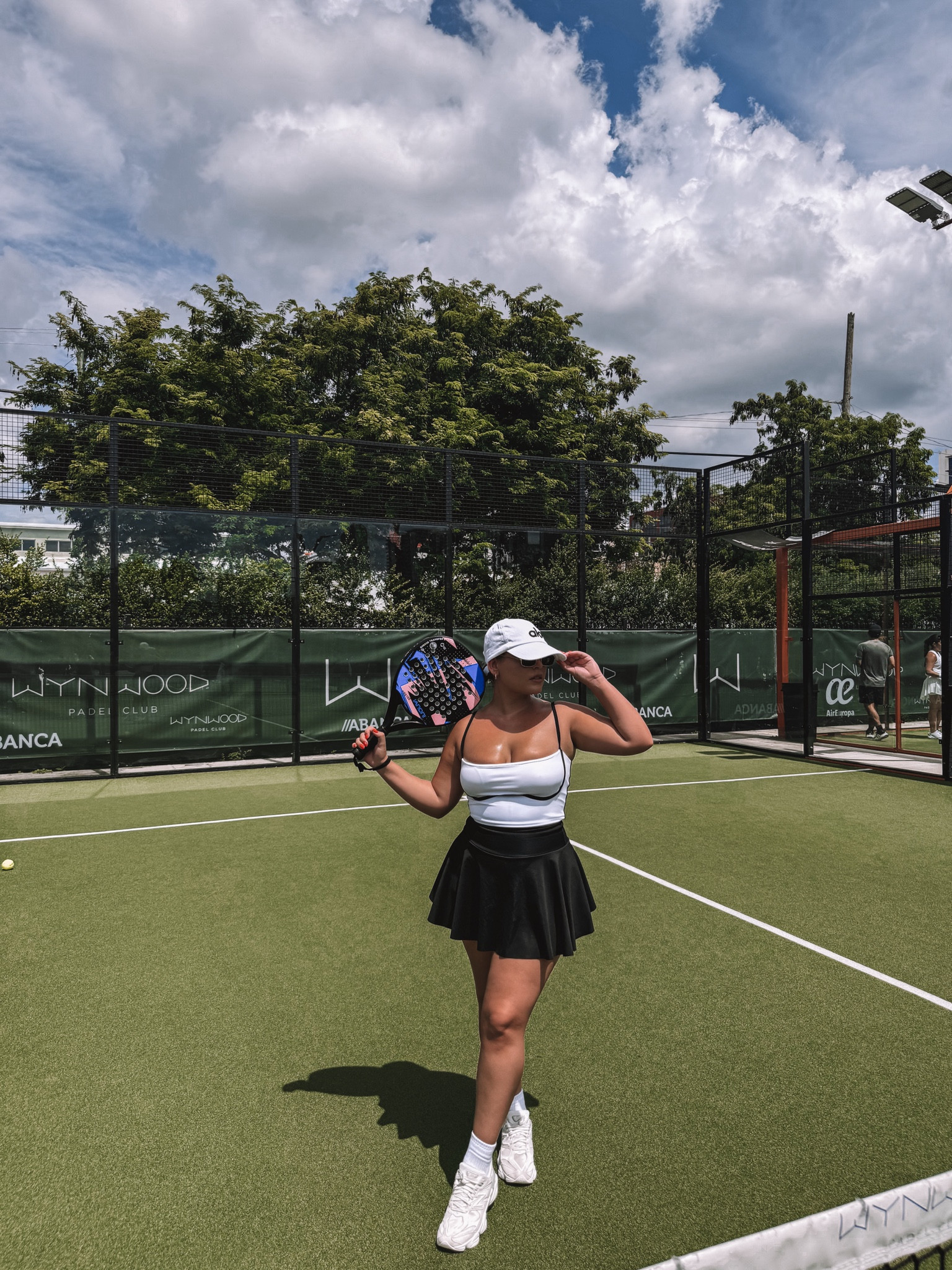 Padel Outfit / Tennis Outfit 
.
.
Tennis skirt, pádel racquet, alo hat, new balance, active wear

#LTKFitness #LTKActive