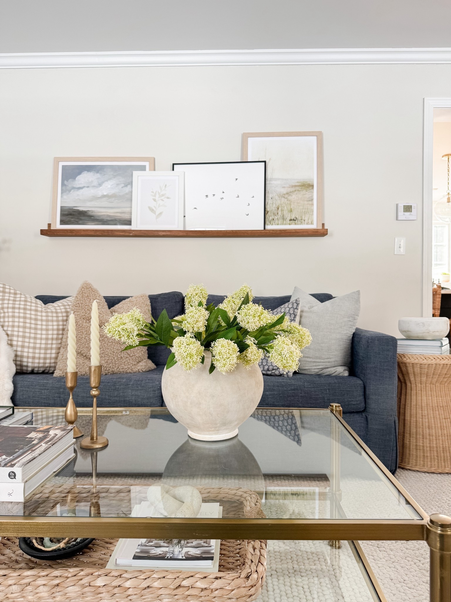 Cozy Living Area 

Neutral home  Home design  Coastal home  Trending home decor  Home styling  Living area gallery frames  coffee table 

#LTKHome