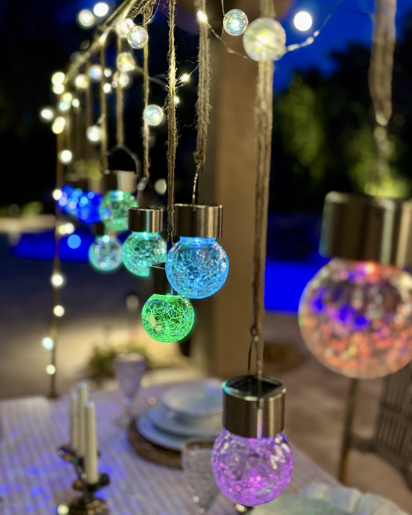 Loving these fun, colorful multicolor Solar Lights for playful, whimsical ambience to use with the table rod, hanging from an outdoor chandelier or hanging from tree branches. 

#outdoorentertaining #backyarddecor #solarlights 

#LTKParties #LTKFindsUnder50 #LTKHome