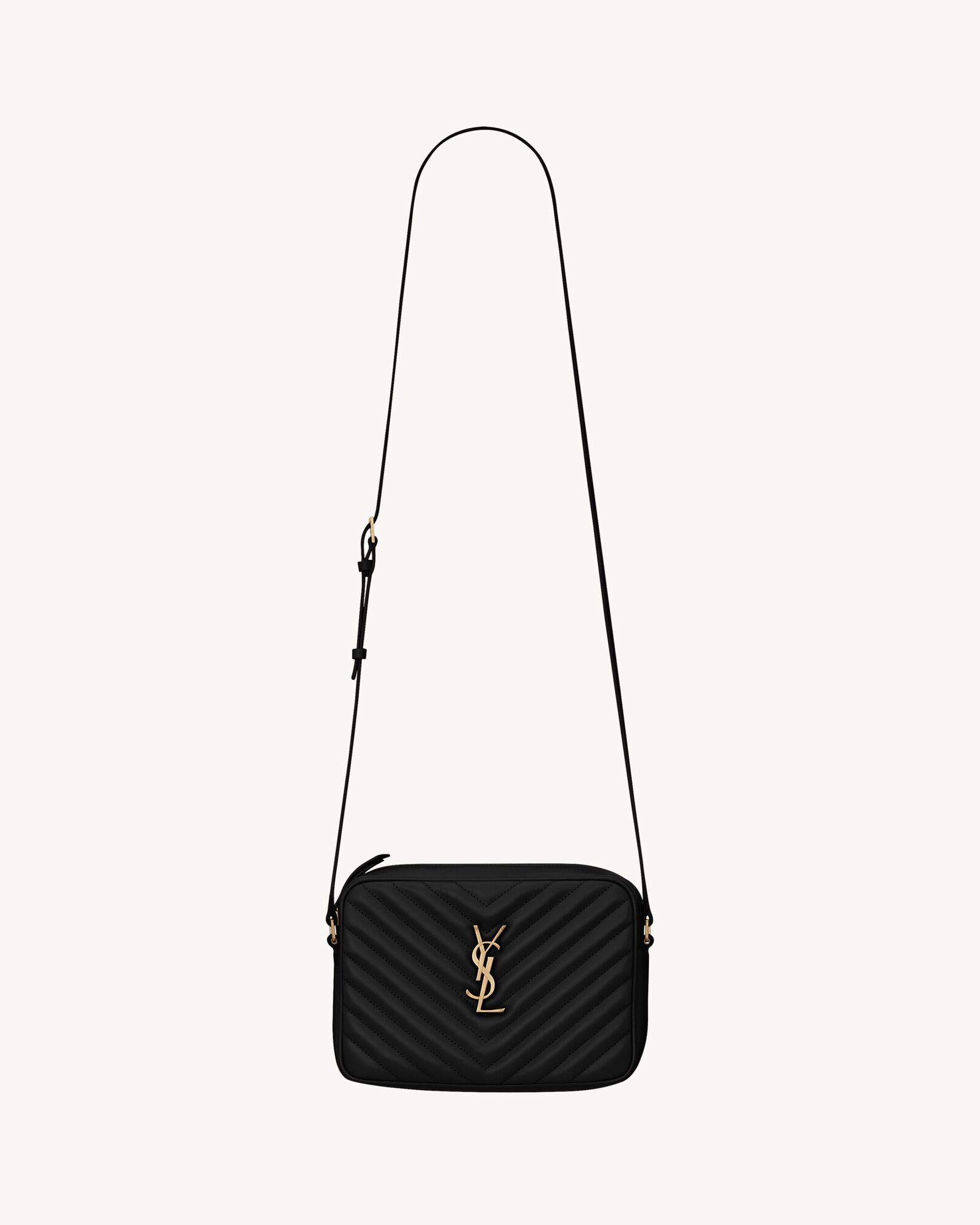 shoulder bag featuring an adjustable leather strap, THE CASSANDRE at the center and quilted overs... | Saint Laurent Inc. (Global)