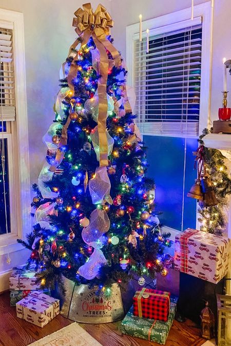 Christmas Decor | Christmas Tree | Farmhouse Christmas Tree | Mesh Ribbon | Ribbon Tree Topper | Gold Ribbon | Viral Christmas Tree | Christmas Tree Collar | Metal Christmas Tree Collar | Farmhouse Tree Collar 

#LTKhome #LTKHoliday #LTKSeasonal
