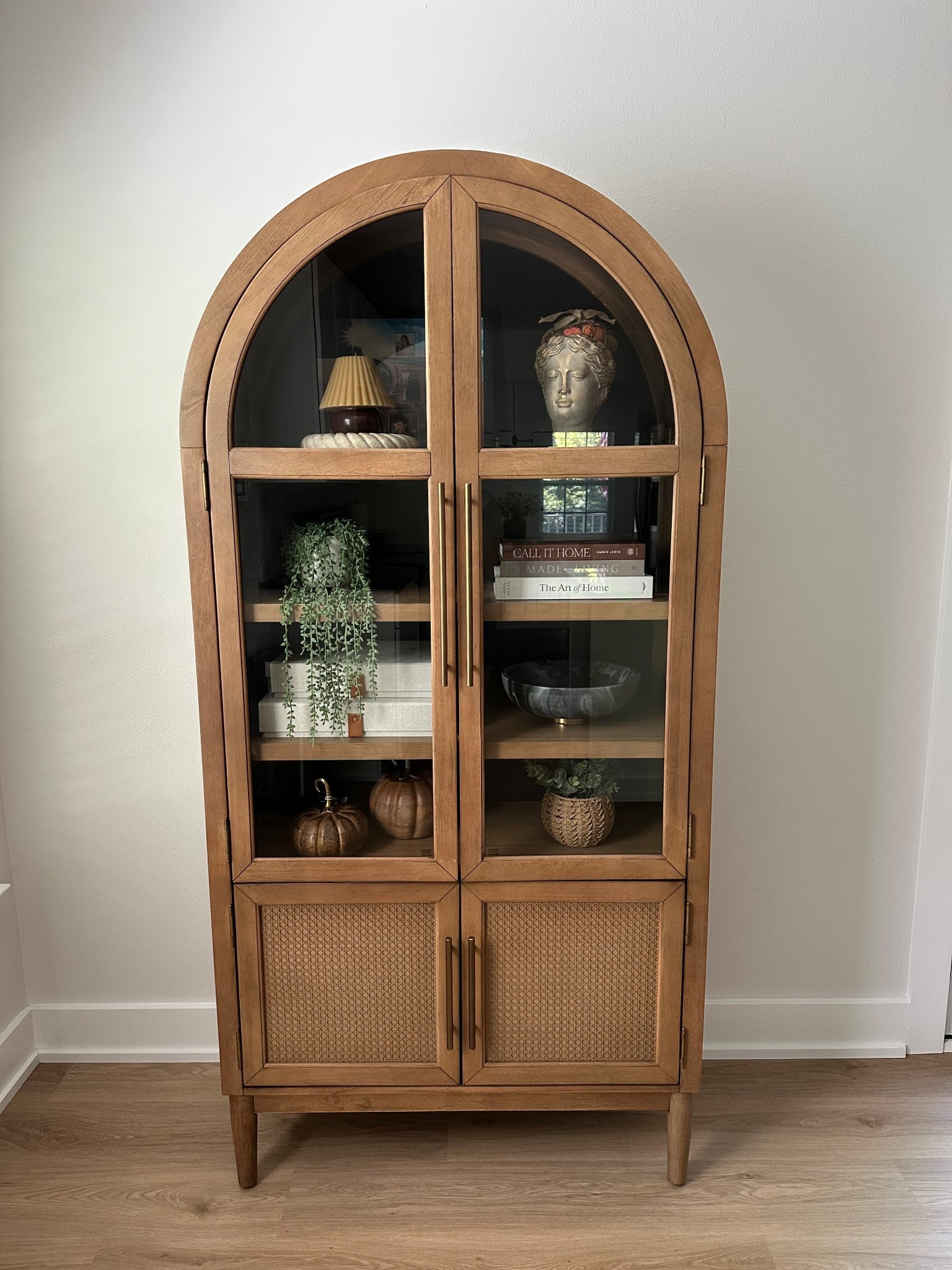 Sam’s Club viral Member's Mark Enzo Storage Cabinet With Rattan Cabinet Doors. Such good quality and finally almost finished styling it!! 

Target lampshade candle & Target marble dish

Made for Living: Collected Interiors for All Sorts of Styles book 

The Art of Home: A Designer Guide to Creating an Elevated Yet Approachable Home book 

Decorative Photo Storage Boxes with Lids - Set of 2 Linen Organizers

The marble bowl and plants are TJ Maxx 

Arch cabinet, wood cabinet, shelf styling, shelf decor, marble dish, stone bowl

#LTKHome #LTKStyleTip