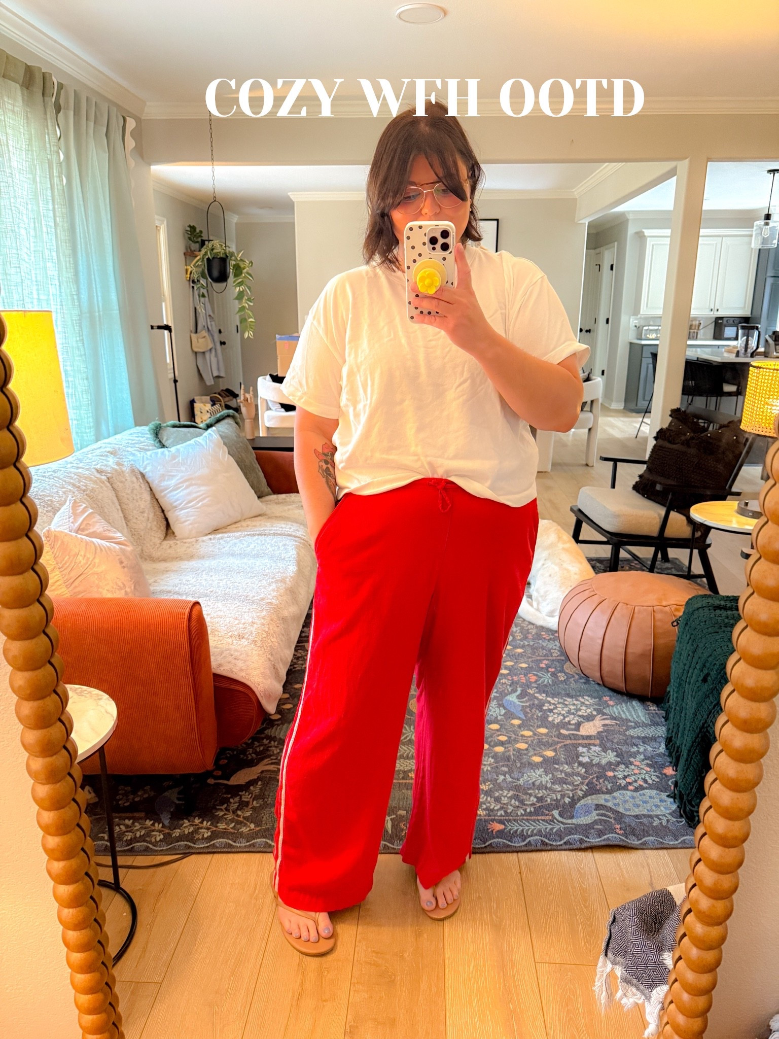 My $7 Walmart flip-flops are doing more for this fit than they have any right to. White cotton tee, red linen track pants, the whole look is soft, breathable, and exactly what a day of back-to-back Zoom calls calls for. The red pants were the one decision I made today and I'm proud of it. Linked everything on my LTK, yes, even the $7 flip-flops.

#LTKfindsunder10 #LTKstyletip #LTKfindsunder50 #wfhoutfit #ootd #loungewear #cozyoutfit #linenpants #workfromhomeoutfit #budgetfinds #affordablestyle #redpants