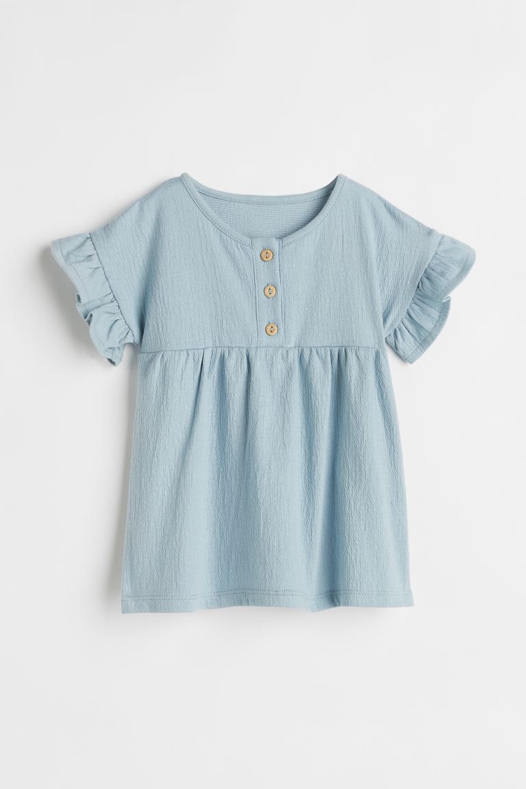 New ArrivalDress in soft jersey. Button placket, short sleeves with flounced cuffs, and a gathere... | H&M (US)