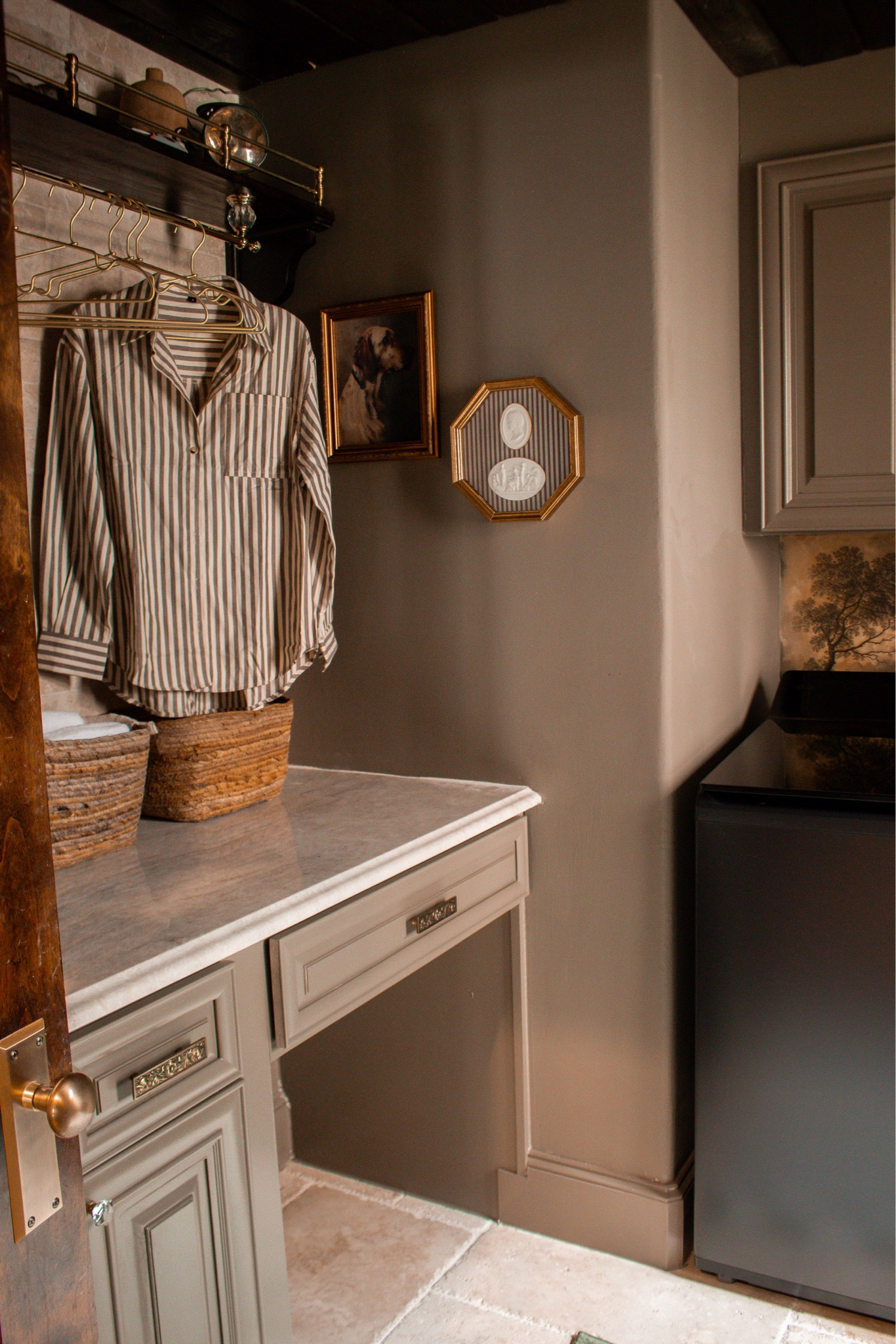 This laundry room proves functional spaces can still be beautiful. The warm tones, vintage-inspired details, and thoughtful storage make everyday chores feel a little more enjoyable.

#LTKSeasonal #LTKHome