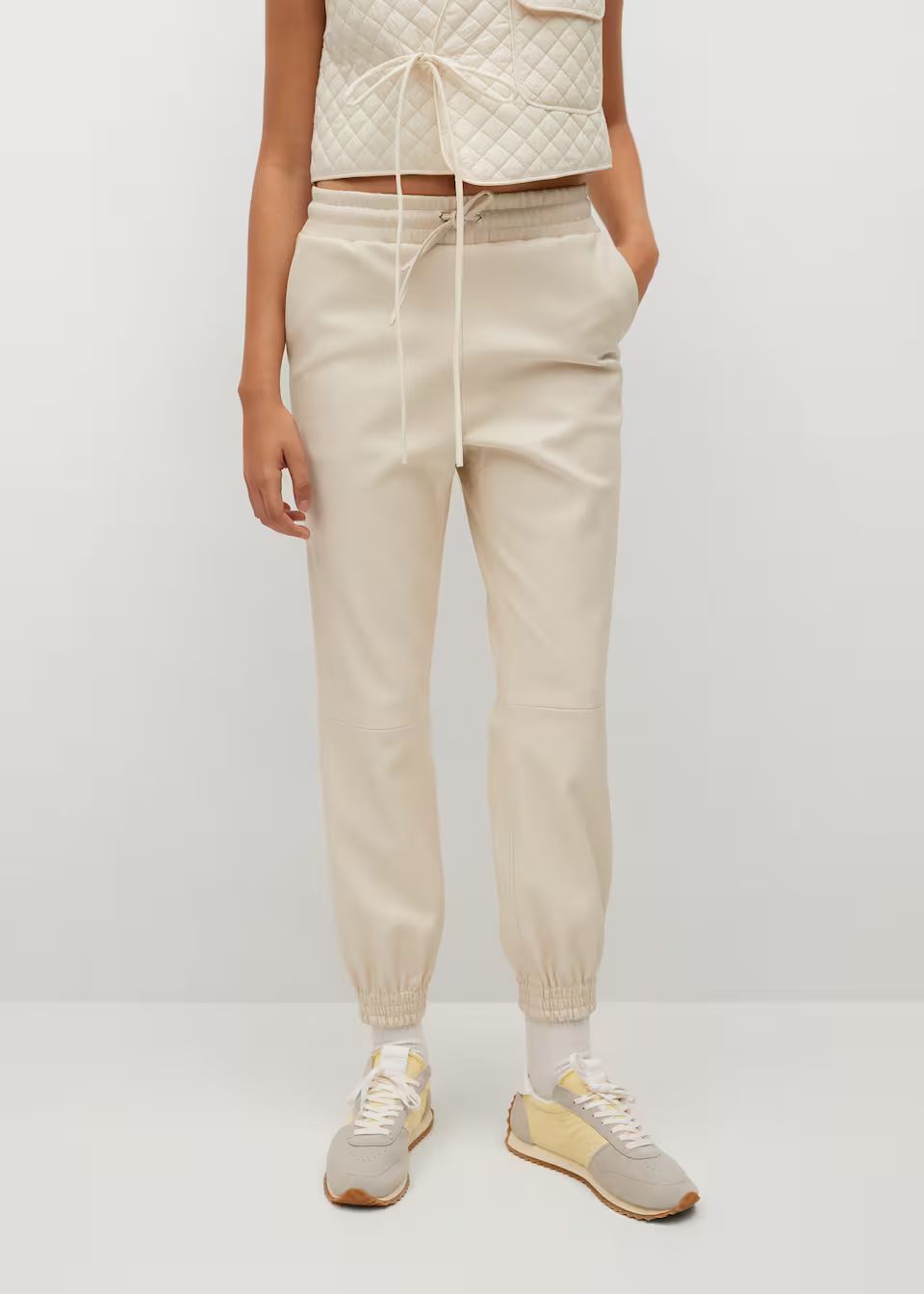 Leather-effect elastic waist trousers | MANGO (US)