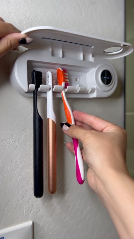 Toothbrush holder and uv light sanitizer on sale right now. 

It charges and does come off the wall if you need to charge it!  

#bathroom 

#LTKhome #LTKfindsunder50 #LTKVideo