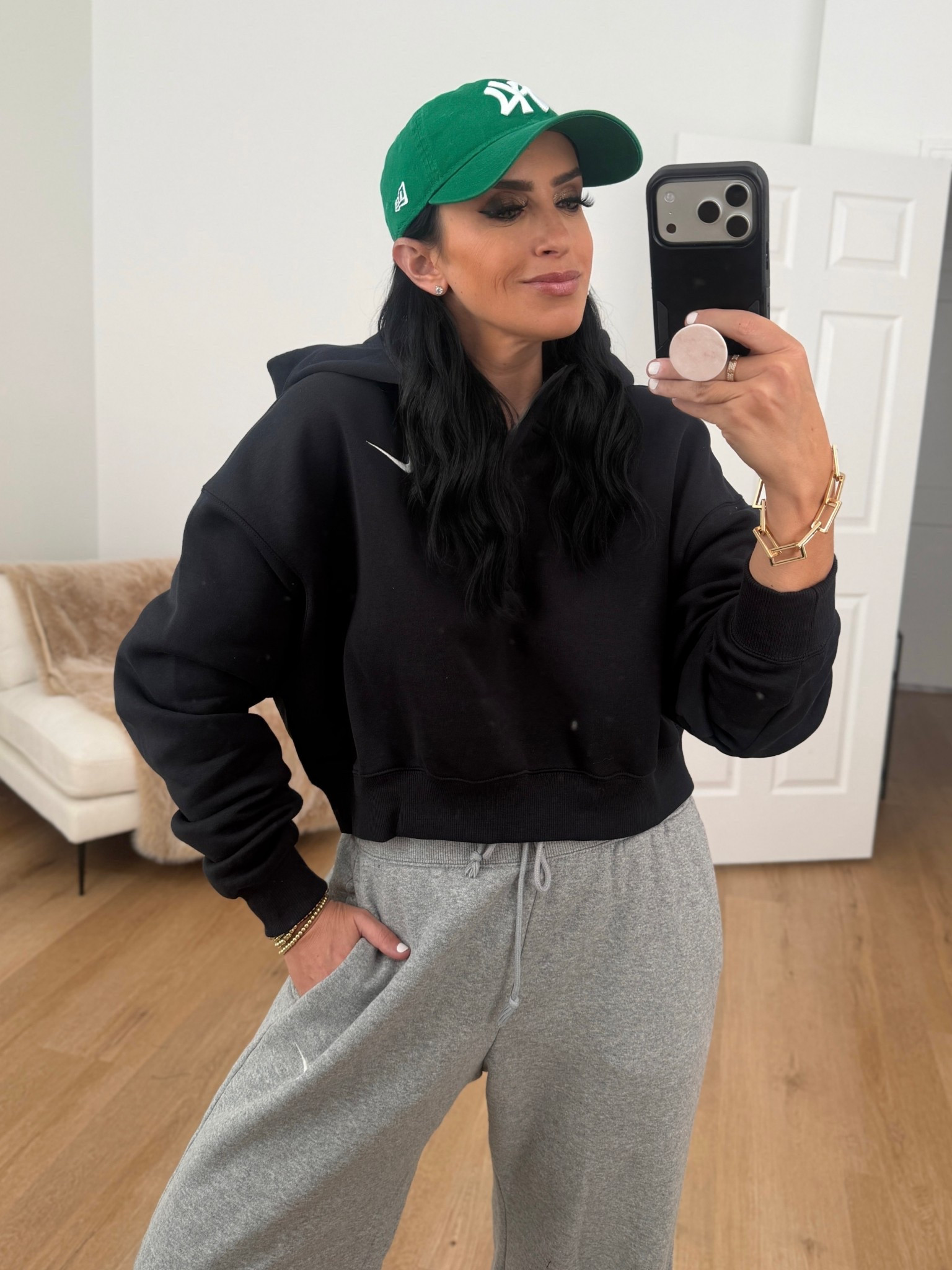 Nike Sportswear Phoenix Fleece Women's Oversized Cropped Henley Hoodie wearing size medium. 