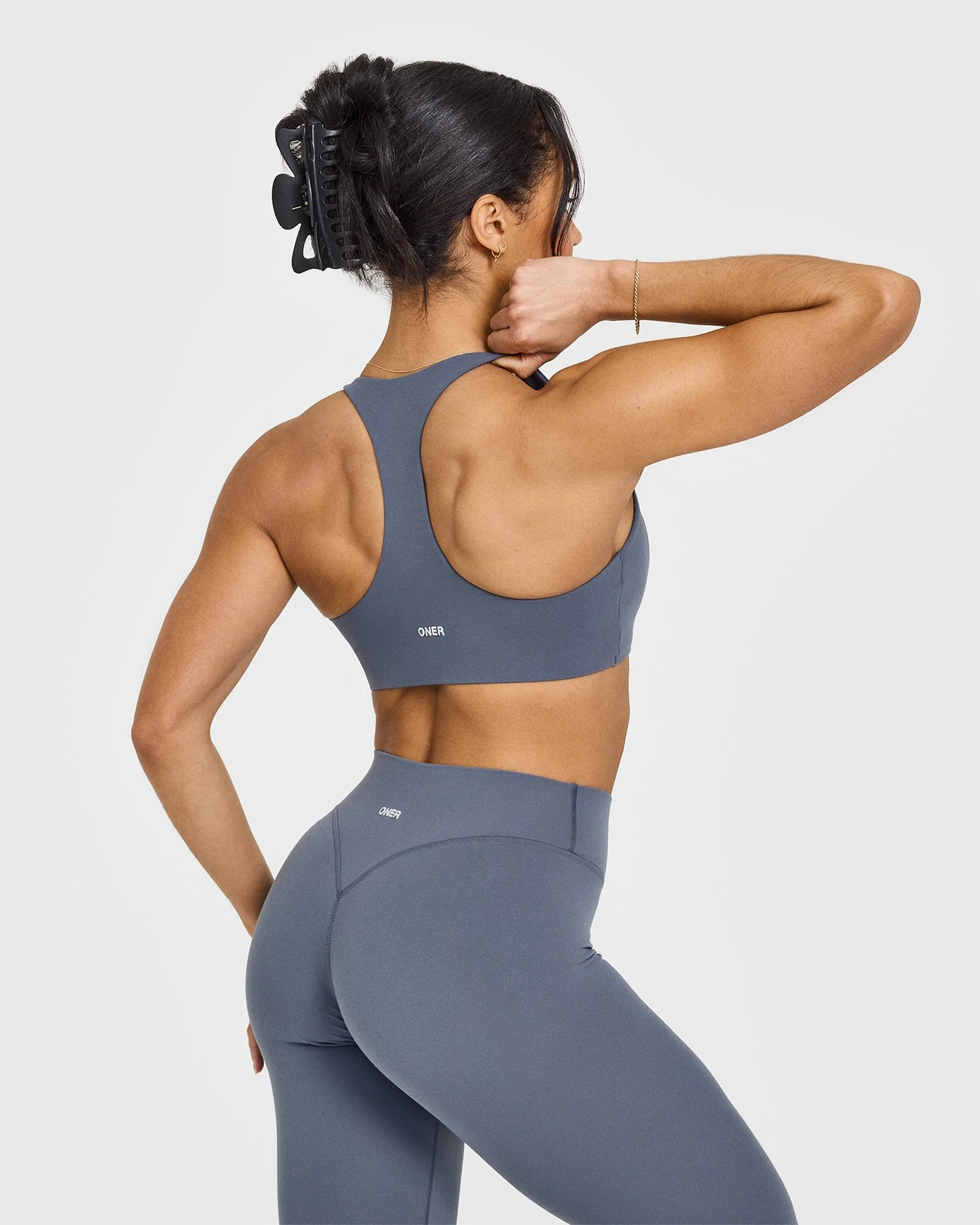 SoftMotion™ Sports Bra with White Logo
Granite Blue | Oner Active (UK / US)