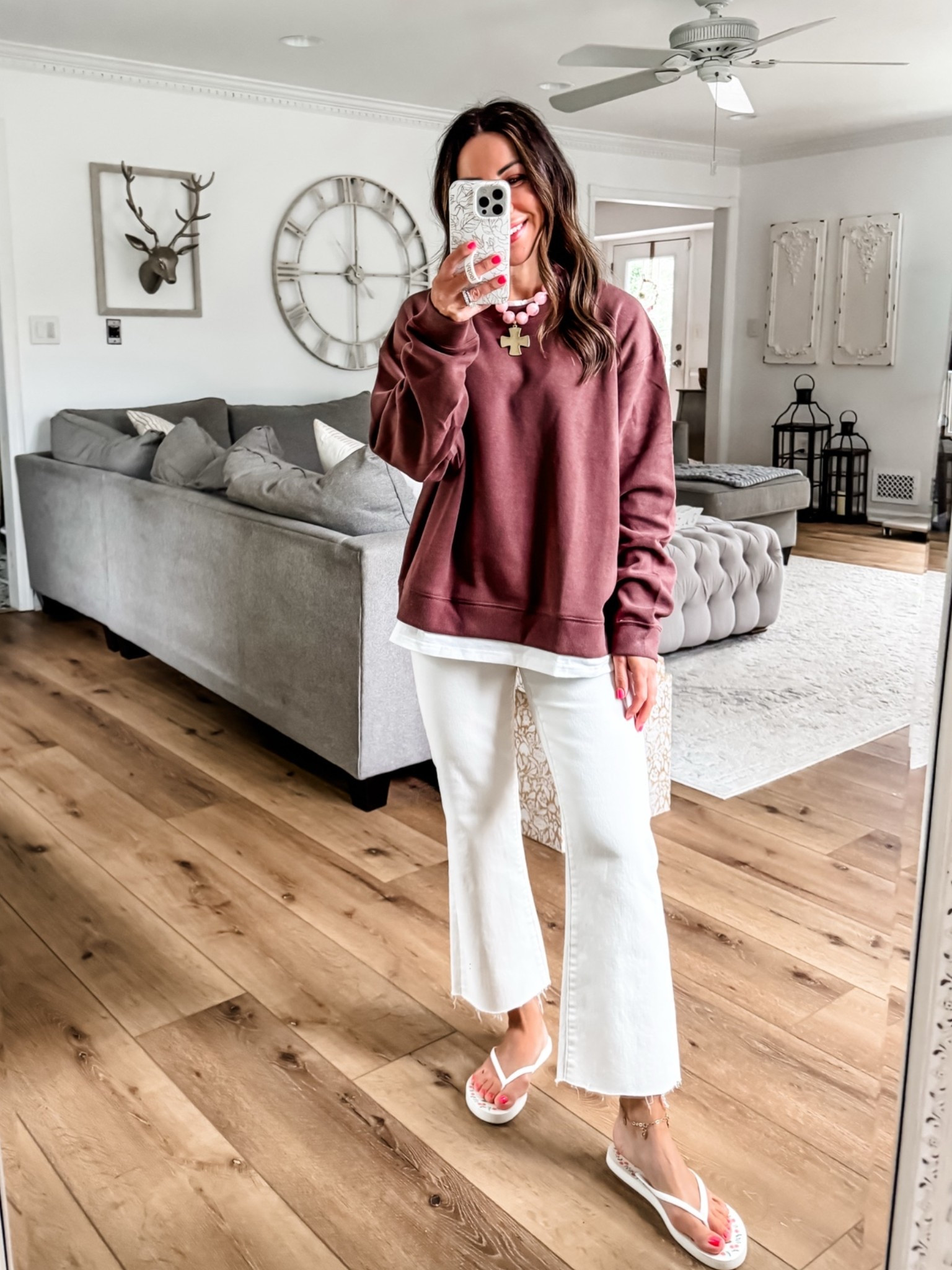 Small brown sweatshirt. 25 white jeans. I cut them. White denim.

#LTKOver40 #LTKSaleAlert #LTKPetite