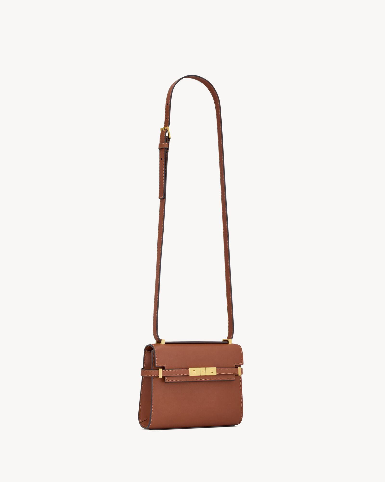 manhattan mini crossbody bag in aged vegetable-tanned leather | Saint Laurent Inc. (Global)
