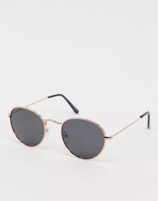 ASOS DESIGN metal round sunglasses with polarised smoke lens in rose gold | ASOS US