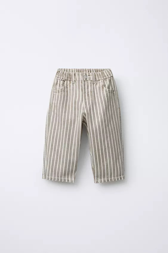 Baggy pants with elastic waistband and front button closure. Front pockets and patch pockets on t... | Zara US
