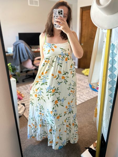 I am obsessed with this white maxi dress with orange and blue florals on it 💙💛💙💛

#LTKunder100 #LTKfit #LTKFind