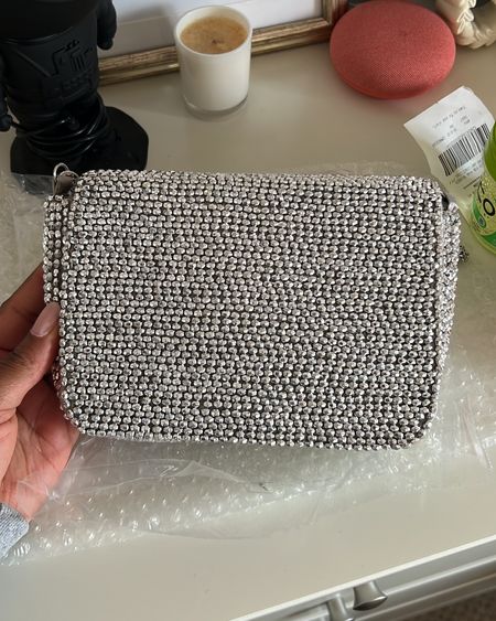 I ordered 3 bags for the LTK Gala and this was the only one that arrived in time 🤦🏾‍♀️ but I’m happy with the choice I didn’t get in the end lol 

It’s silver diamanté beaded hand embellished, lined with an inside pocket too and big enough to hold my iPhone, and all the other bits I needed for the evening. 

Can be used as a clutch but also has a long chain shoulder strap. 

#LTKfindsunder50 #LTKGala #LTKitbag