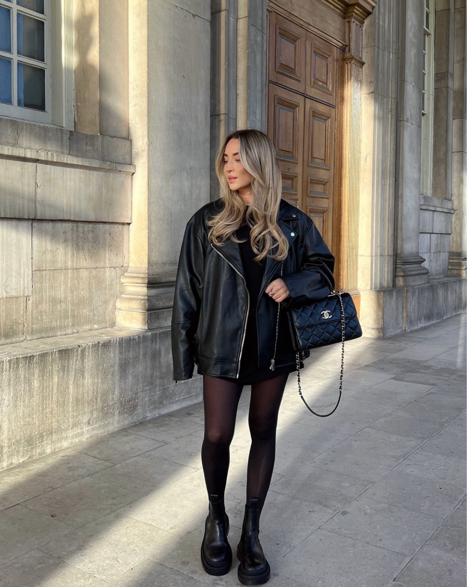 All Black Autumn Looks 03 - can never go wrong with an oversized leather jacket, tights and boots. Perfect cool girl chic look for an effortless fit

#LTKstyletip #LTKautumn