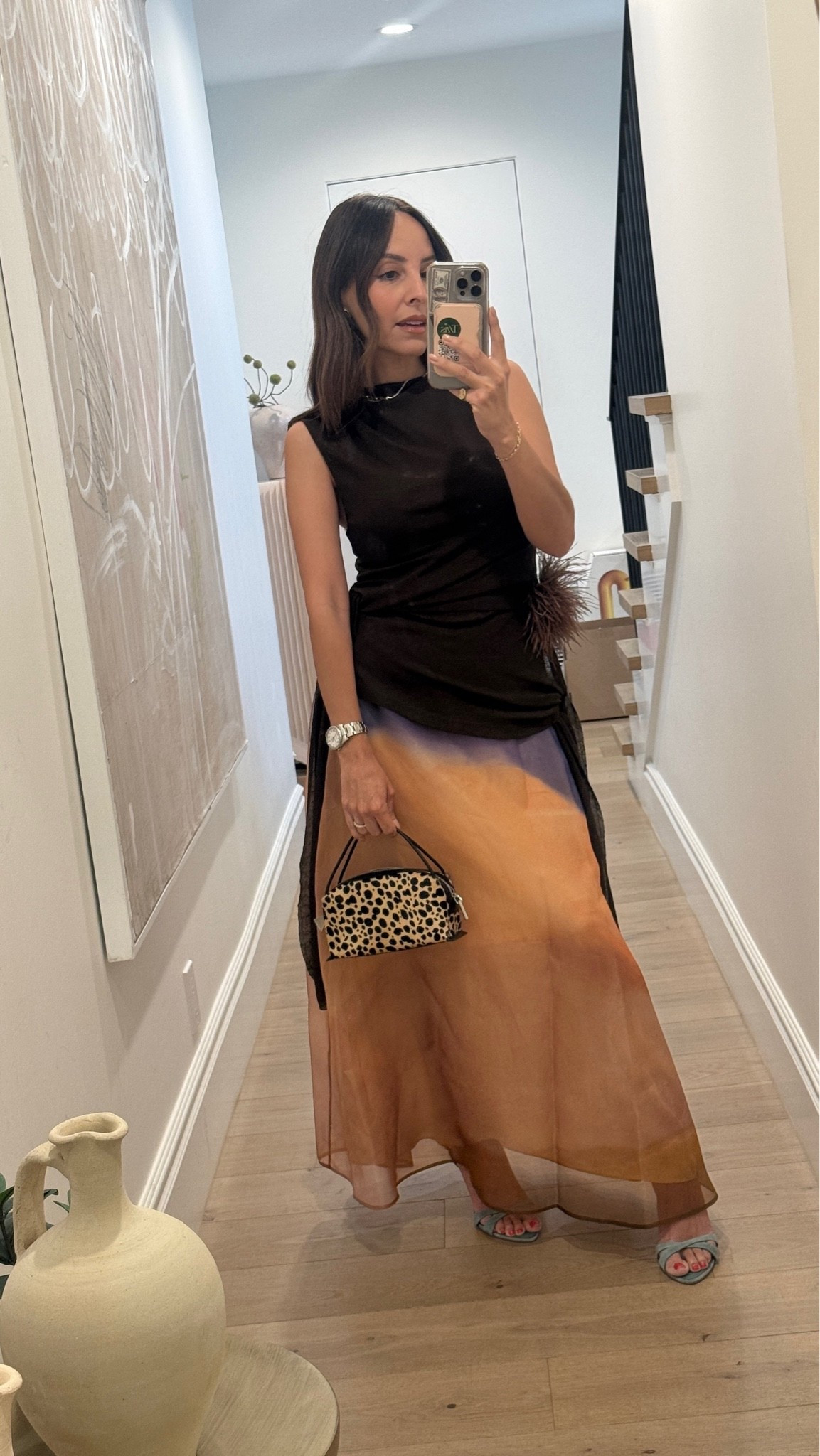 A quick mirror pic of this look 🤎 prepare to be sick of me wearing this skirt because it’s quickly becoming one of my most-worn pieces. The colors, the prints, the accessories - everything about this outfit just works.

#LTKootd #LTKWorkwear #LTKdayinmylife