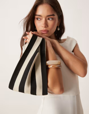 ASOS DESIGN loop through clutch bag in mono stripe | ASOS | ASOS (Global)