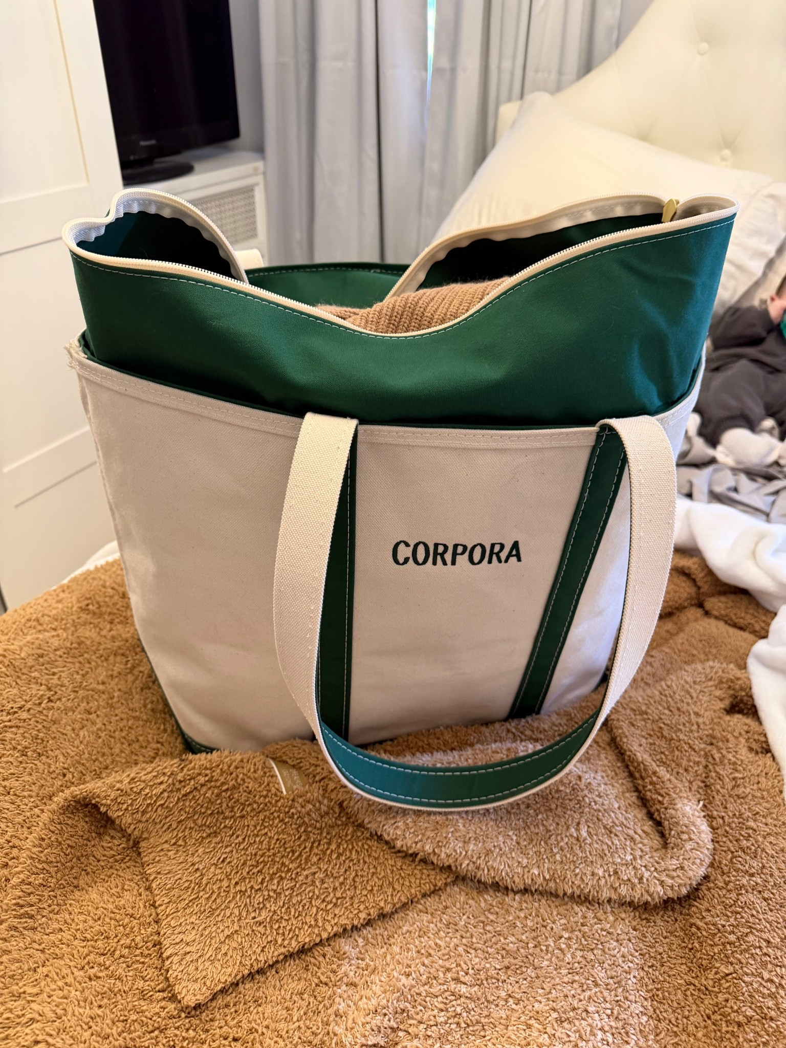 finally,  breaking out my boat and tote! I got this as a gift with the baby and it holds so much! Love the customization options - ours is the XL with long handles in dark green. #easterbasket #mothersday￼

#LTKmomlife #LTKTravel #LTKBaby